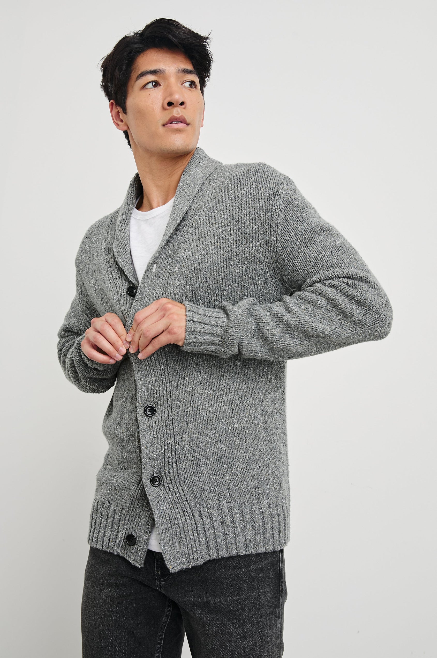 Corden Long-Sleeve Cardigan with Button Closure, a Shawl Collar and Ribbed Trim in Monochromatic Speckle Colorway, white and Black Speckles on Grey - Front View Featured on Model