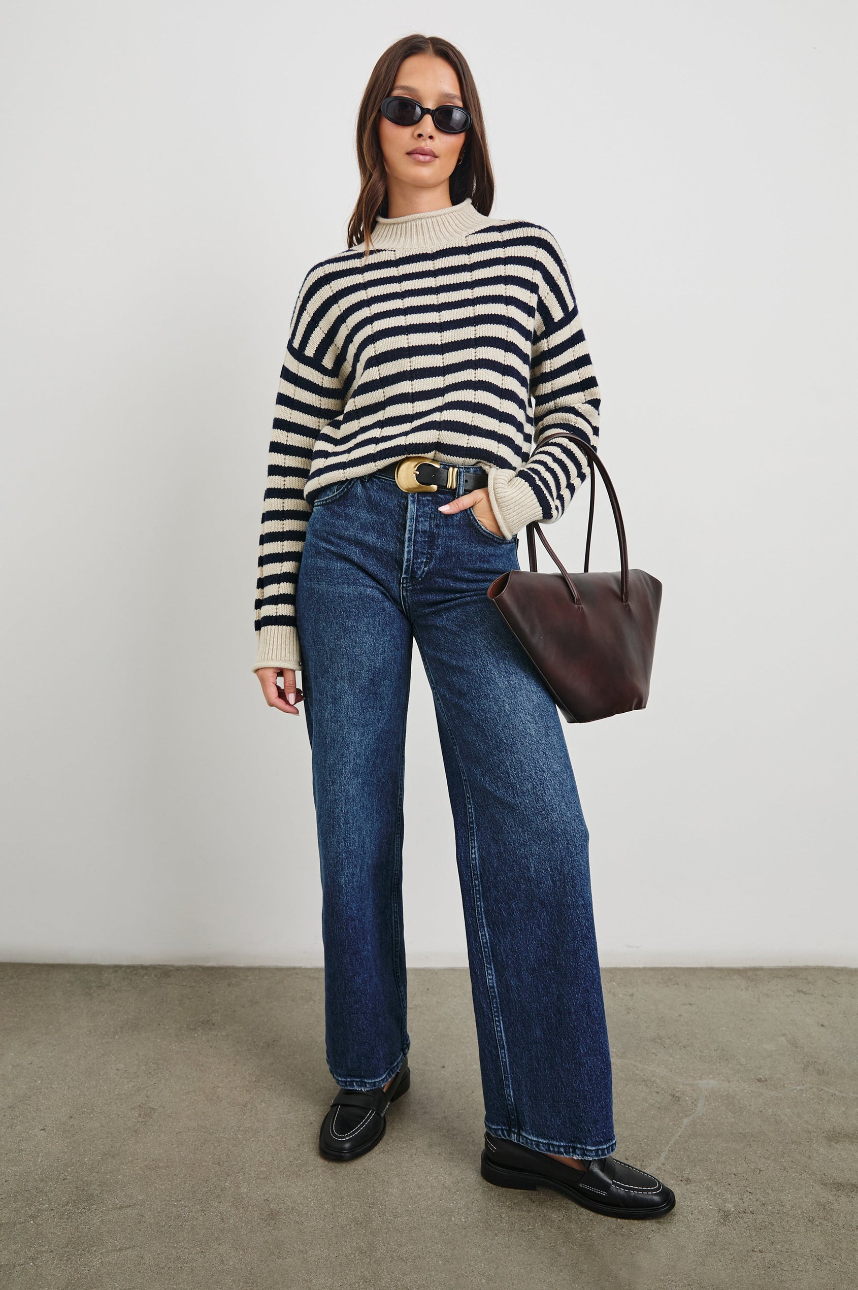 Corrine Long-Sleeve Sweater with Ribbed Trim and a Mock Neck in Oat Navy Stripe Colorway, Horizontal Stripes - Front Full Body View Featured on Model 