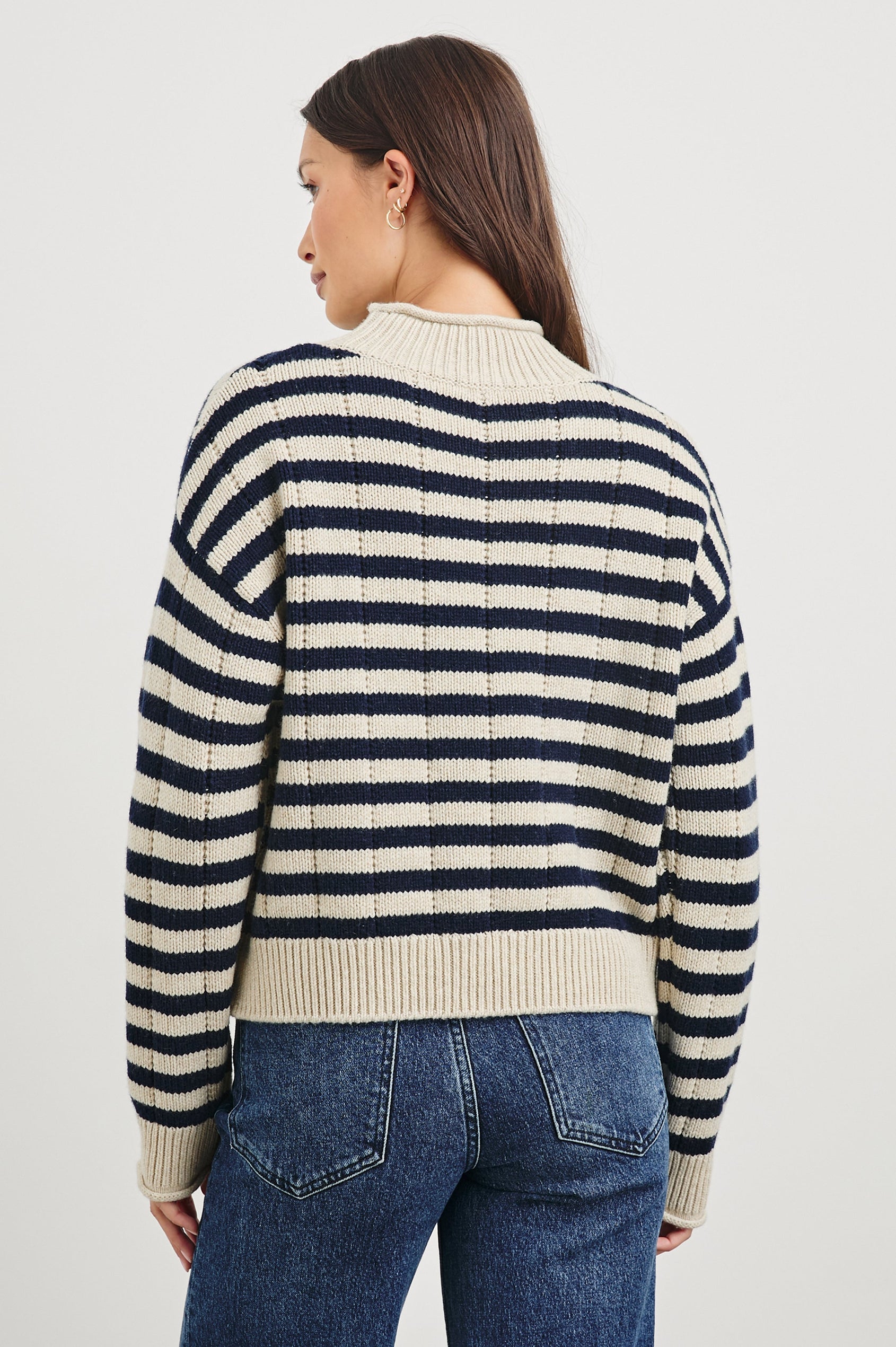 Corrine Long-Sleeve Sweater with Ribbed Trim and a Mock Neck in Oat Navy Stripe Colorway, Horizontal Stripes - Back View Featured on Model 