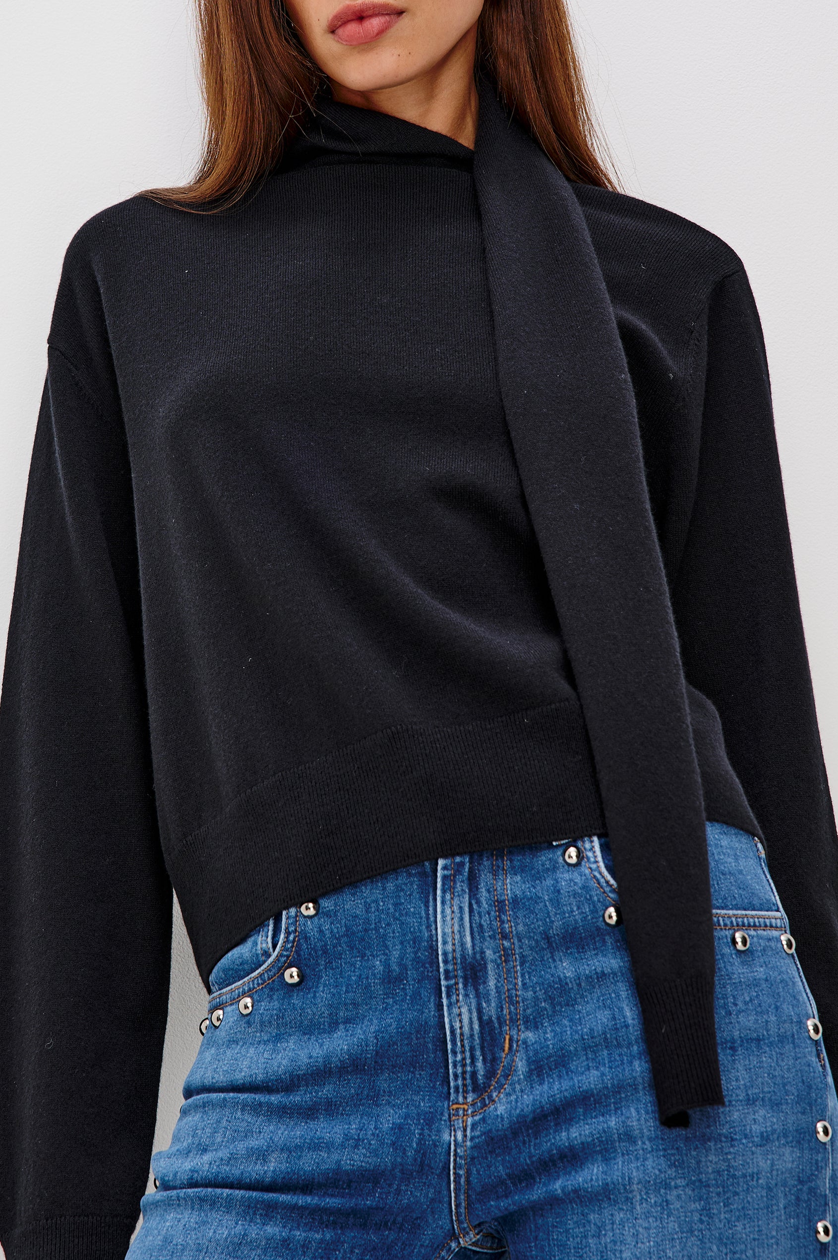 Cortina Wool Cashmere Blend Sweater with an Attached Self-Tie Scarf, Relaxed Fit With Dropped Shoulders, Long Sleeves, and Ribbed Trim in Black Colorway - Upper Body Close Up Front View Featured on Model