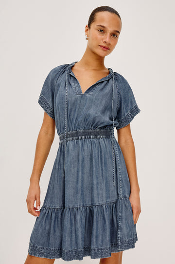 Corvera Mini Dress in TENCEL™ With Split V-Neckline, Short Raglan Flutter Sleeves, Elastic Waist, Tiered Skirt, and Loose, Relaxed Fit in Blue Ridge Colorway - Upper Body Front View Featured on Model