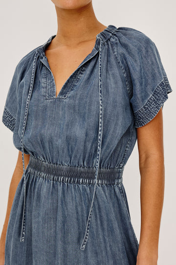 Corvera Mini Dress in TENCEL™ With Split V-Neckline, Short Raglan Flutter Sleeves, Elastic Waist, Tiered Skirt, and Loose, Relaxed Fit in Blue Ridge Colorway - Upper Body Front View Featured on Model