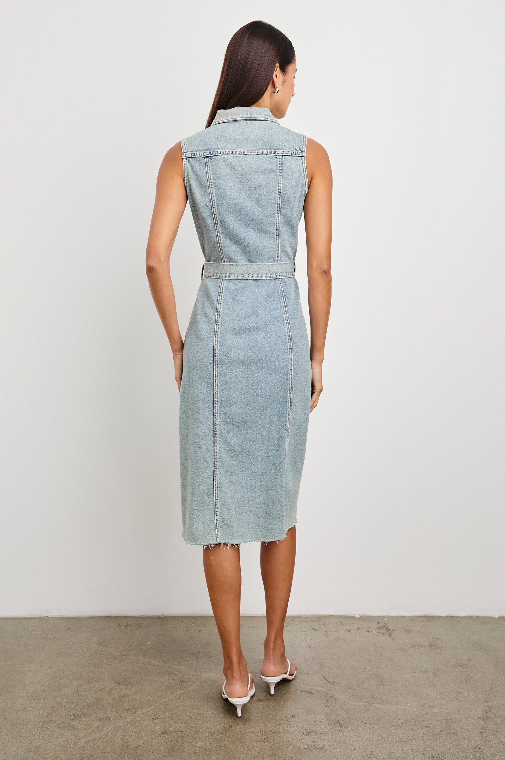 Costa form fitting, short sleeve denim midi dress with adjustable O-ring belt and front buttons in Low Tide - back view on model