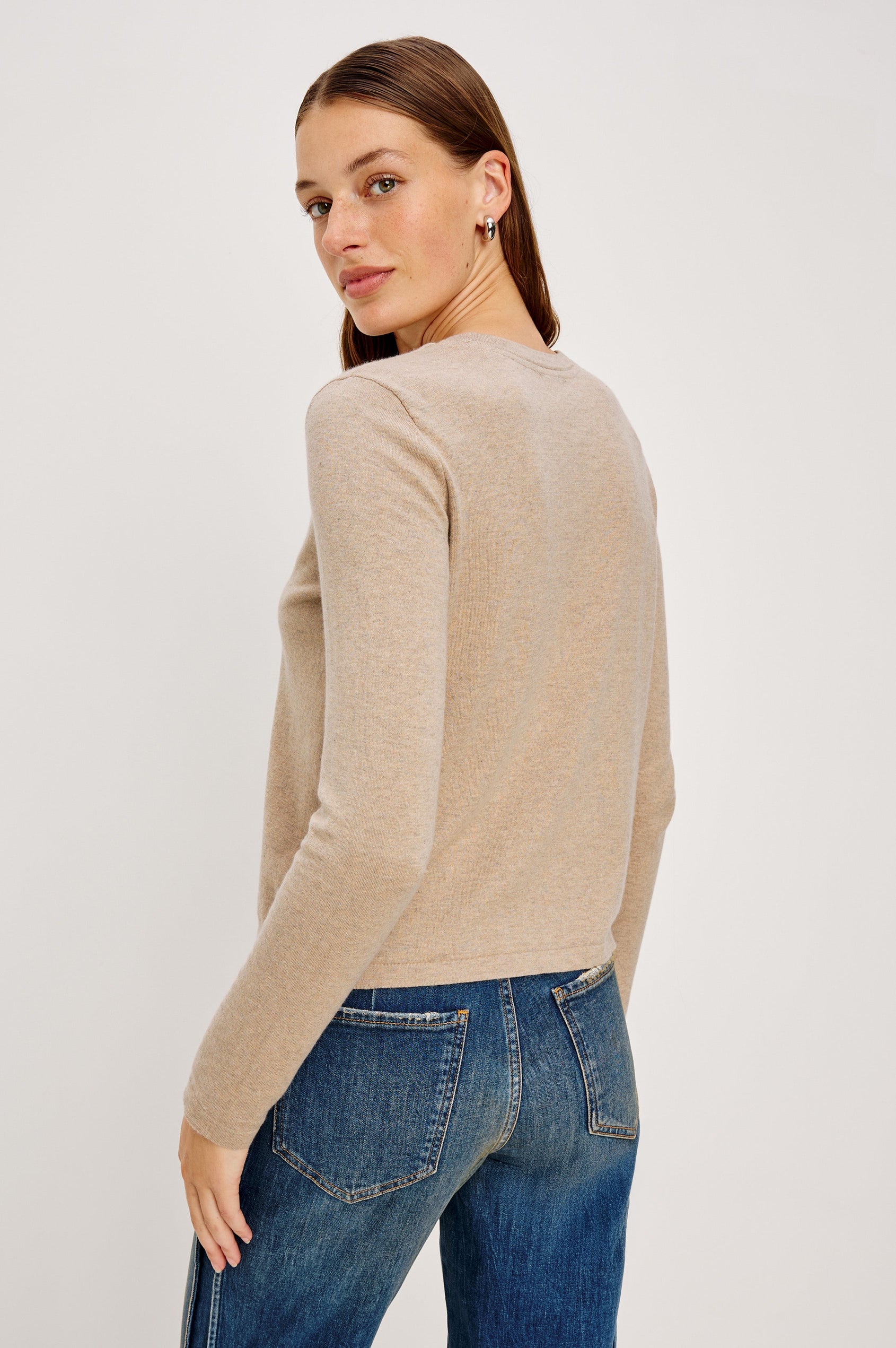 Cotton Cashmere Long Sleeve Tee with Crew Neckline in Heather Oat Colorway - Back View Featured On Model