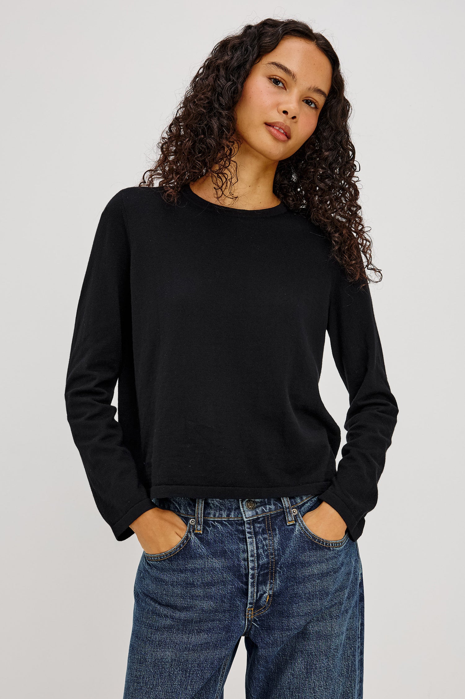 Cotton Cashmere Long Sleeve T-Shirt With Crewneck, Long Sleeve, Slightly Cropped Fit in Black Colorway - Upper Body Front View Featured on Model