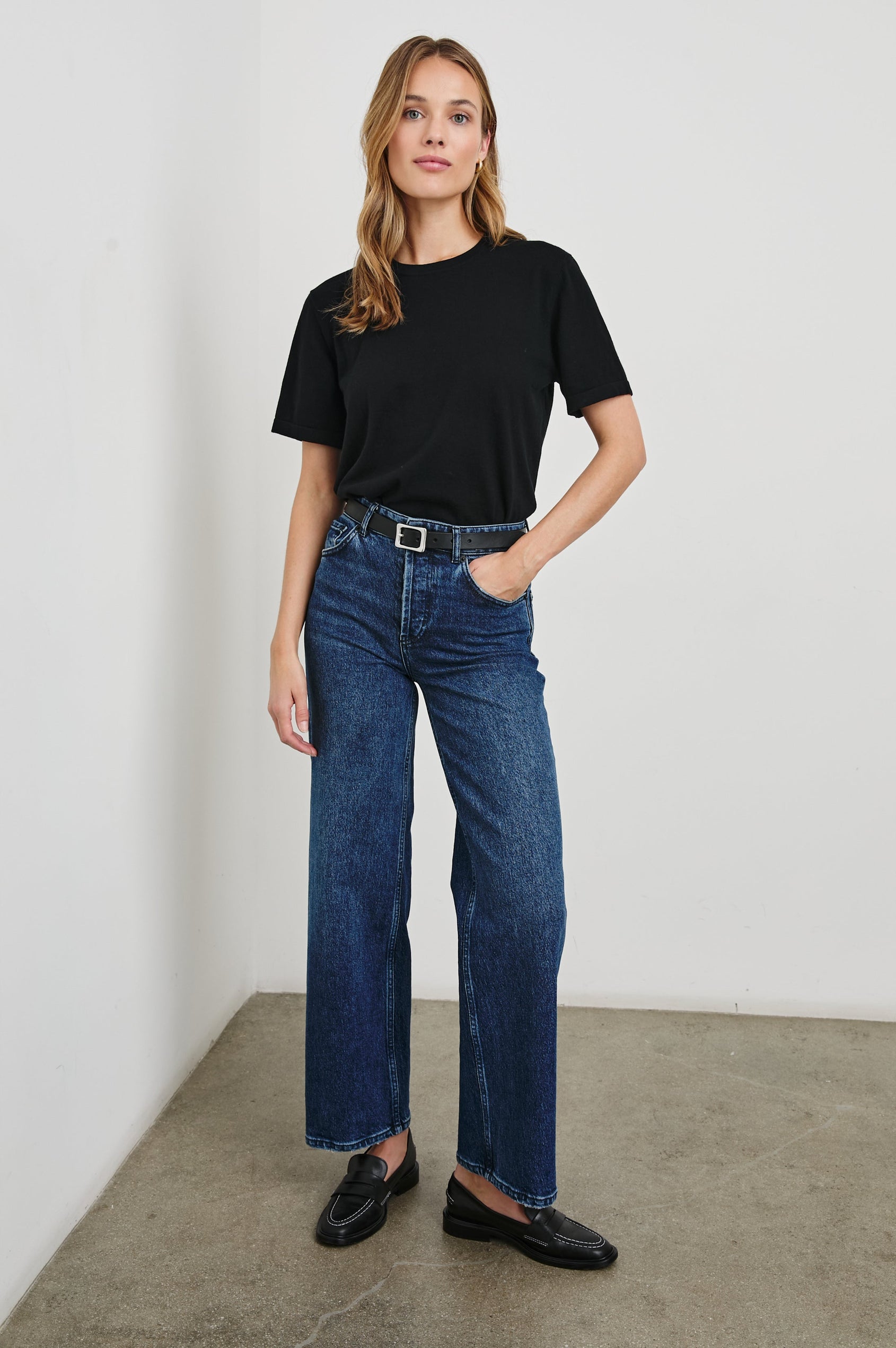Cotton Cashmere T-shirt with Crew Neckline in Black Colorway - Front tucked Full Body View Featured On Model