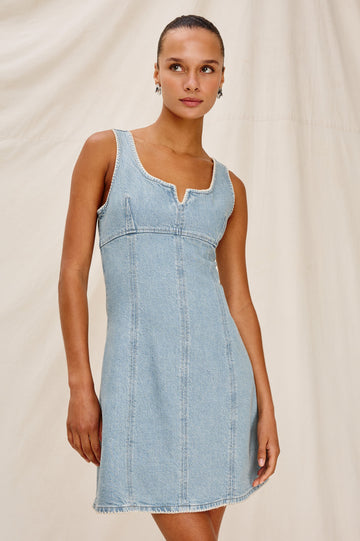 Cove Denim Tank Dress with a Scoop Split neck, Empire Bust, A-line and Above-Knee Length in Capri Colorway.  Front View Shown on Model.