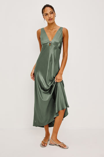 Cressia Midi Dress in Satin With Bias Cut and V-Neckline With Keyhole Cutout and Molded Metallic Jewelry in Ivy Colorway - Full Body Front View Featured on Model