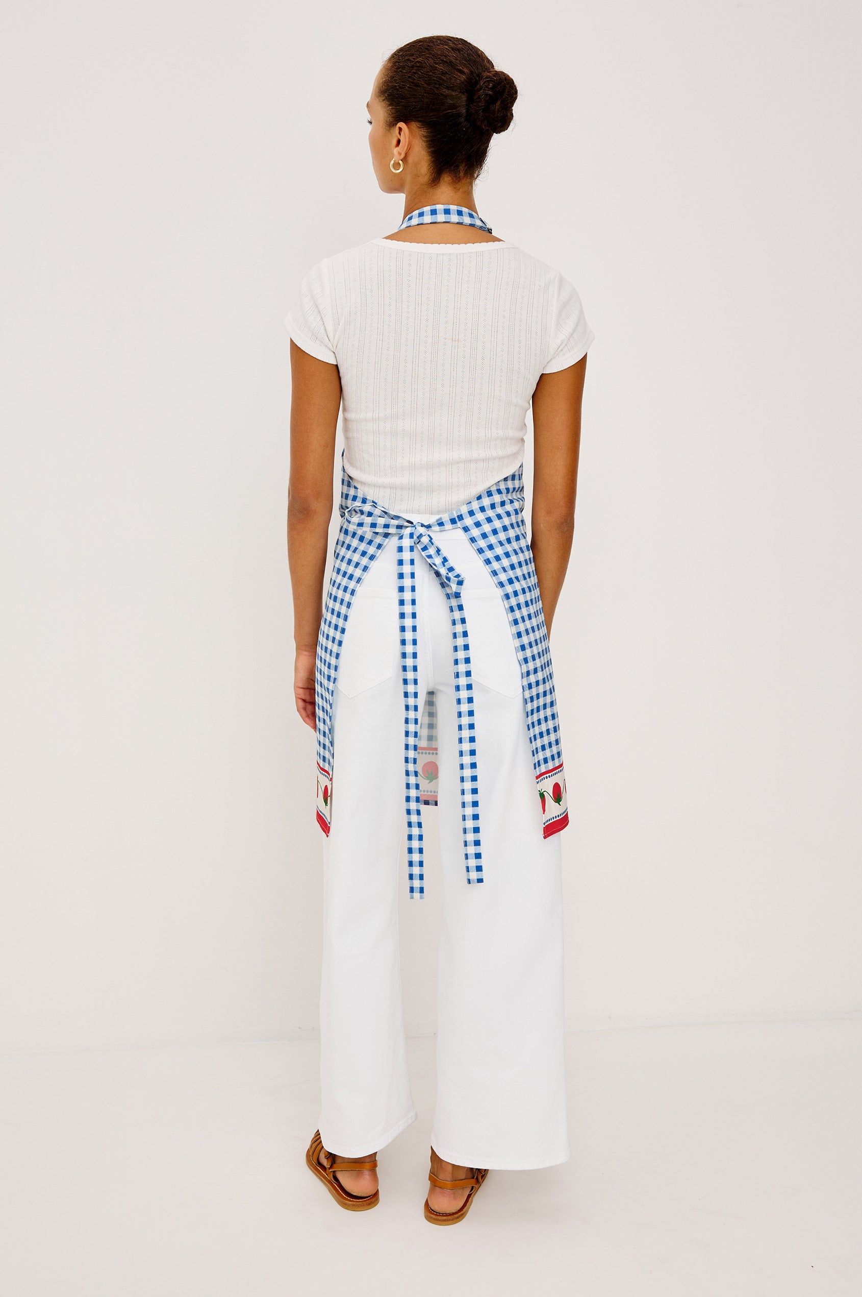 Cucina Apron in Cotton With Adjustable Halter Strap and Adjustable Back Ties in Gingham Tomatoes Colorway - Full Body Back View Featured on Model