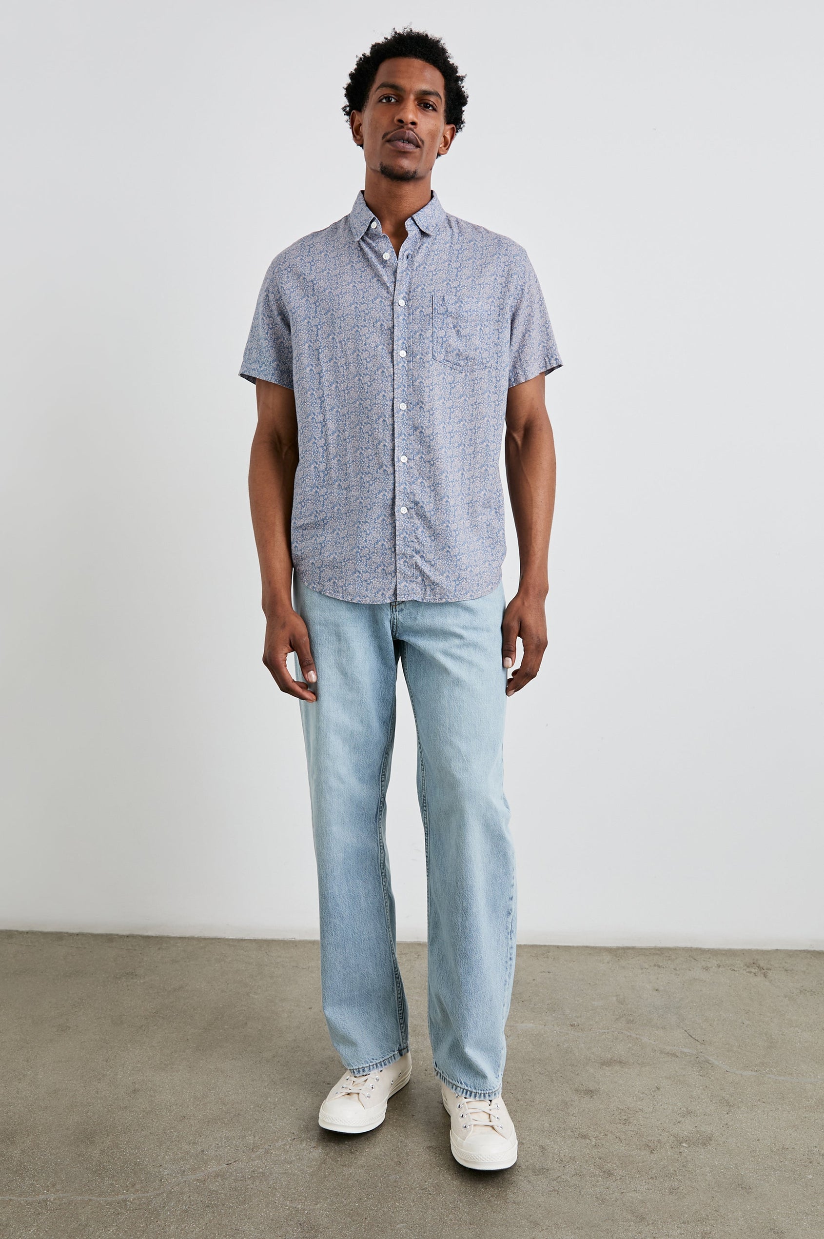 Cutler 90's Loose Jeans with Belt Loops, Two Front Pockets plus a Coin Pocket and Two Back Patch Pockets in Vintage Light Wash Colorway - Full Body View Featured on Model