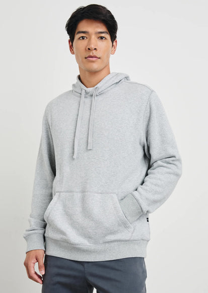 FRONT IMAGE OF MODEL WEARING CALVIN HOODIE IN HEATHER CREAM STRIPE