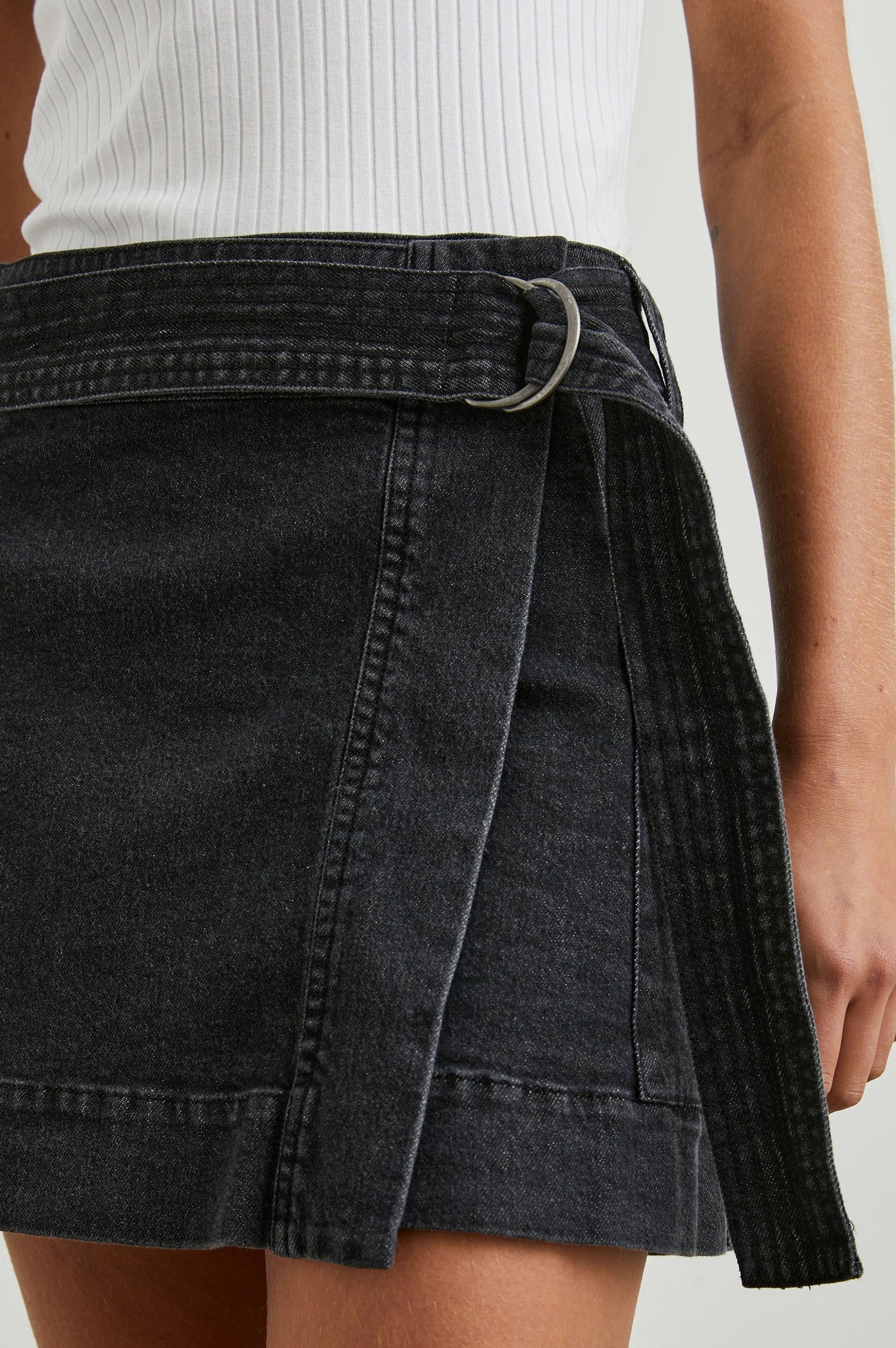 Deanna Mini Wrap Skirt with Fabric Belt and Two Side Pockets in Black Pearl Colorway - Front View Featured on Model