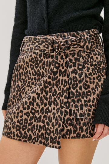 Deanna Mini Wrap Skirt with Fabric Belt and Two Side Pockets in Brown Nala Colorway - Front Detail View Featured on Model