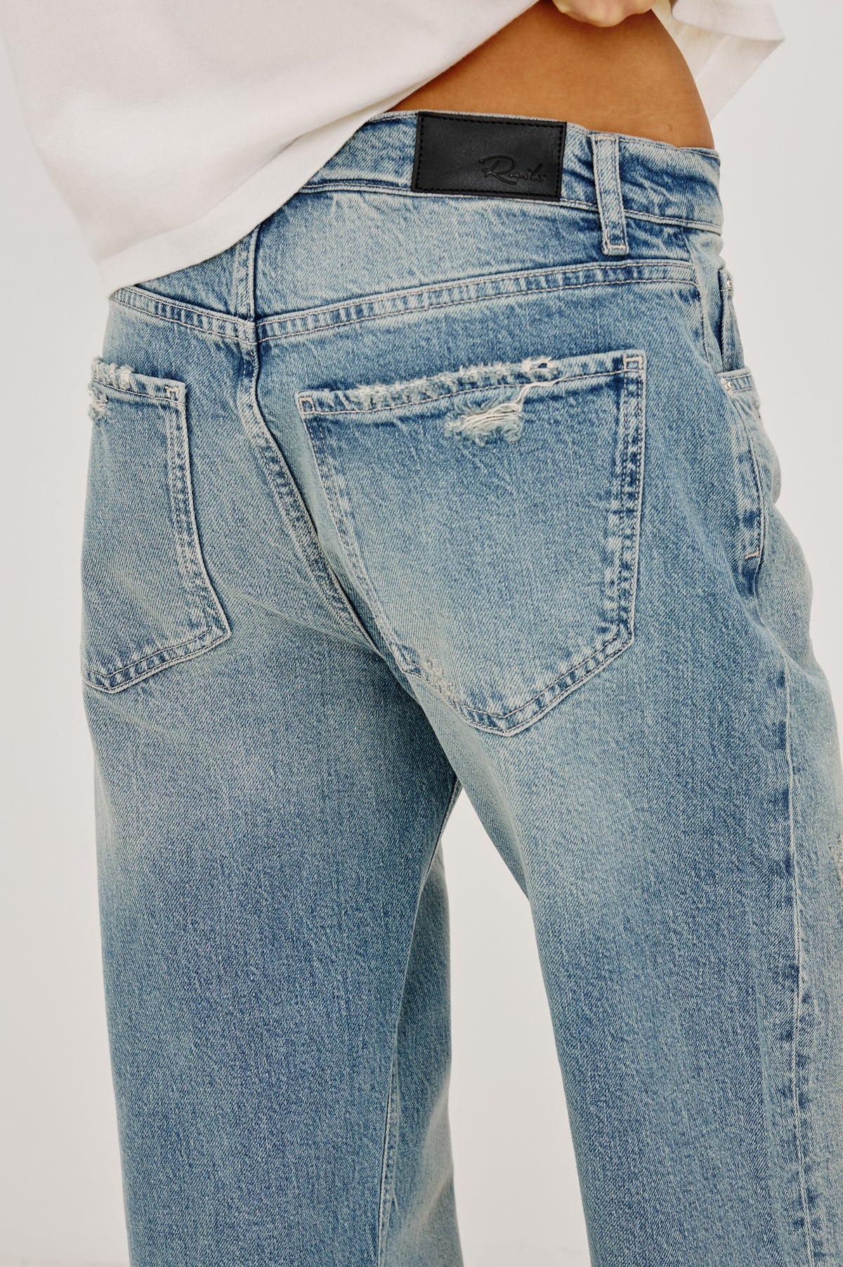 Del Mar Boyfriend Jean in Rigid Drapey Denim With Low-Slung Fit, Wide Relaxed Legs, 5-Pockets, and Button Fly in Archive Colorway - Close-up front view featured on model.