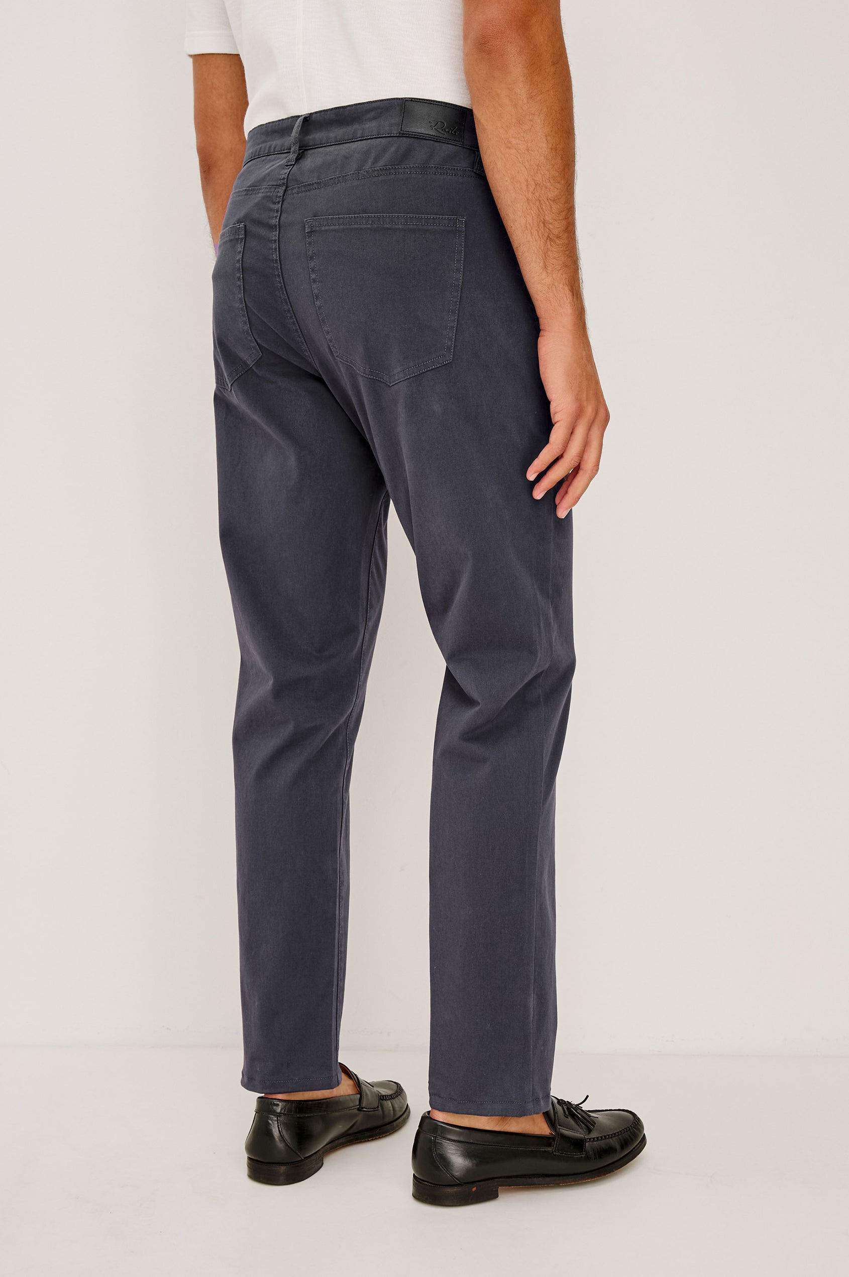 Dempsey Slim Straight Pant in Cotton Stretch With Front Zip Fly, 5-Pockets, and Belt Loops in Faded Grey Colorway - Lower Body Back View Featured on Model