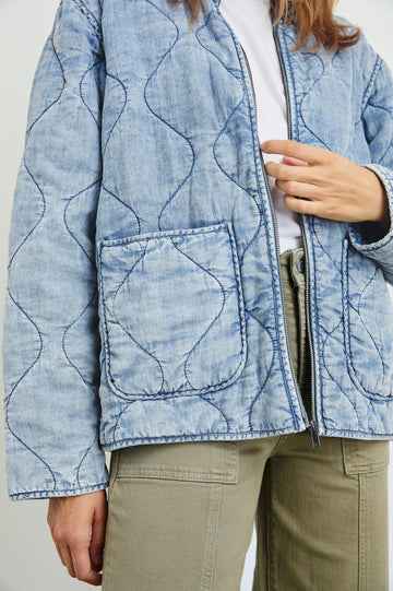 Denver Jacket with a Zip Up Closure, Two Front Patch Pockets and Quilted Stitching in Med Vintage Cloud Wash Colorway - Front View Featured on Model