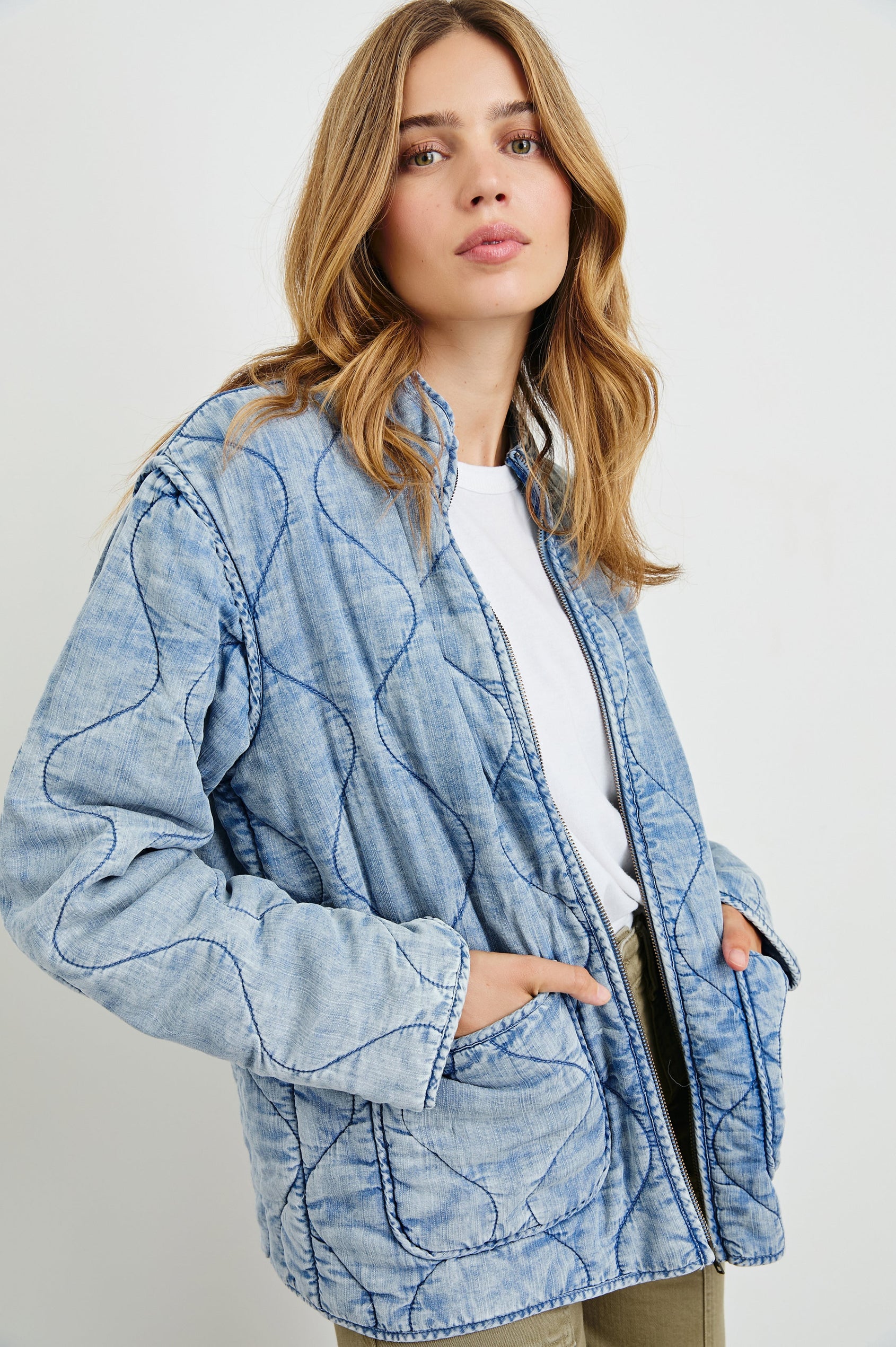 Denver Jacket with a Zip Up Closure, Two Front Patch Pockets and Quilted Stitching in Med Vintage Cloud Wash Colorway - Front View Featured on Model