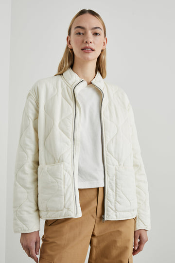 Denver Jacket with a Zip Up Closure, Two Front Patch Pockets and Quilted Stitching in Pearl Colorway - Front View Featured on Model