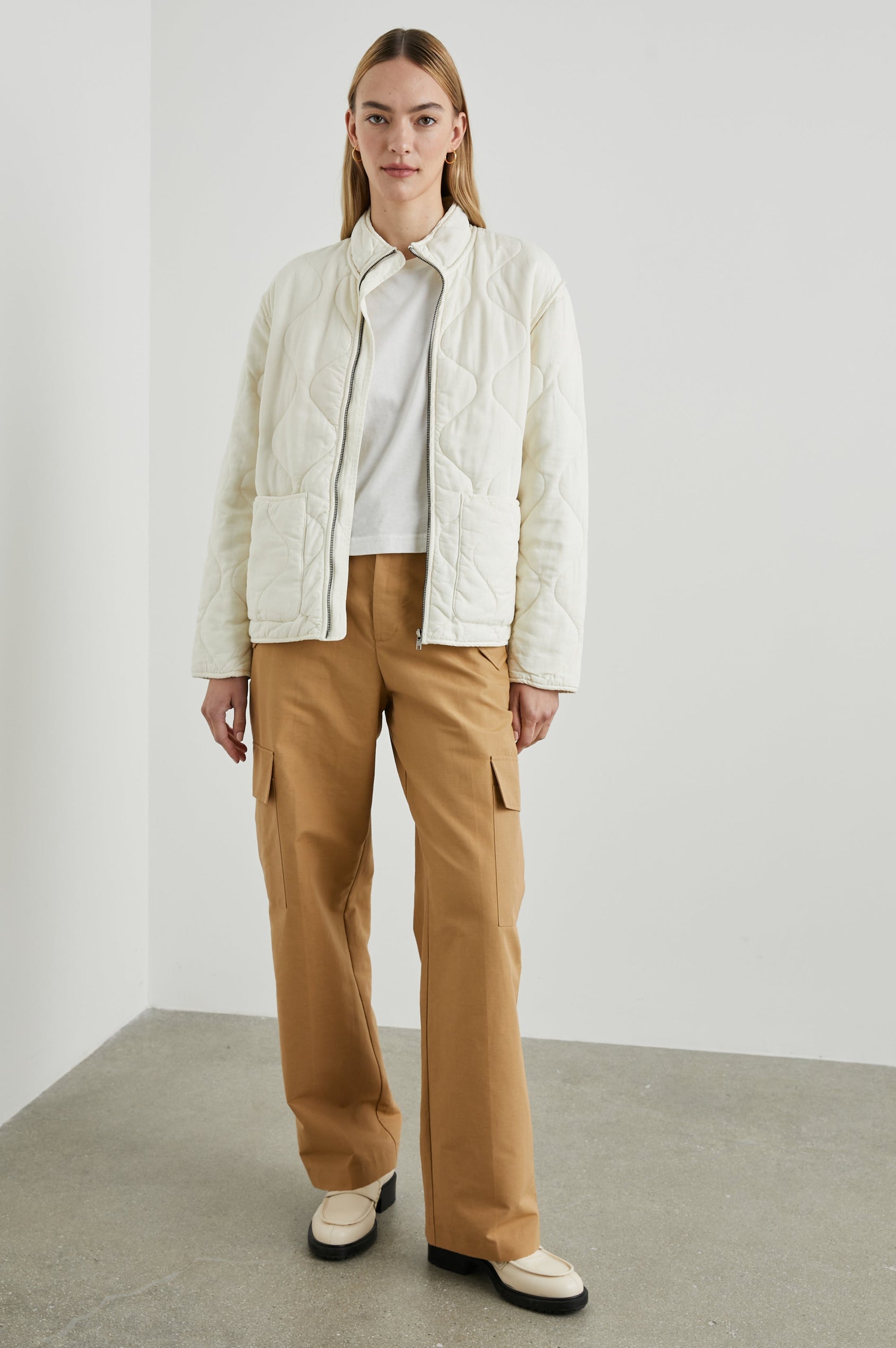 Denver Jacket with a Zip Up Closure, Two Front Patch Pockets and Quilted Stitching in Pearl Colorway - Front Full Body View Featured on Model