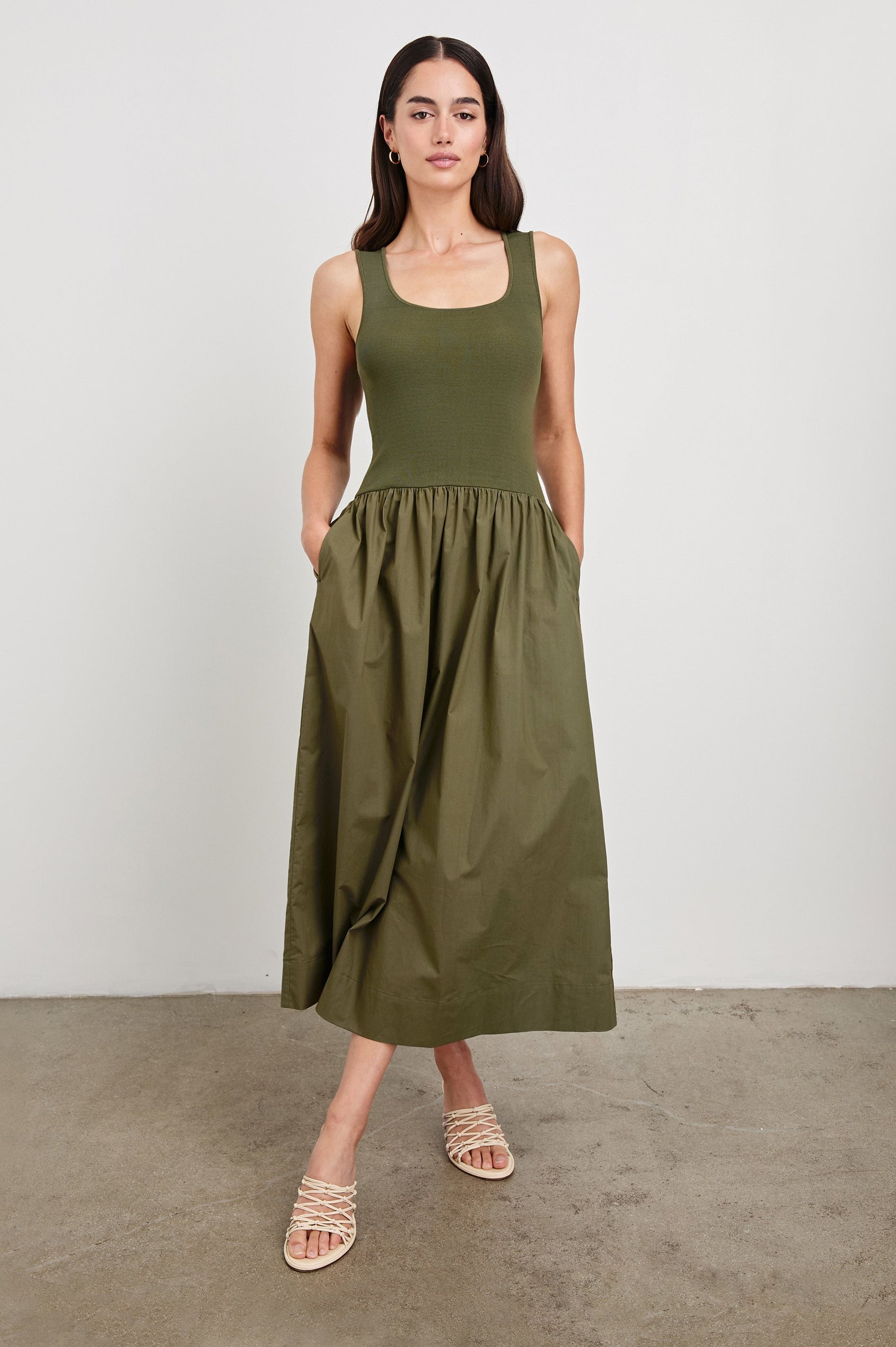 Dia tank midi dress with scoop neck and fitted bodice in Olive colorway - full body front view on model