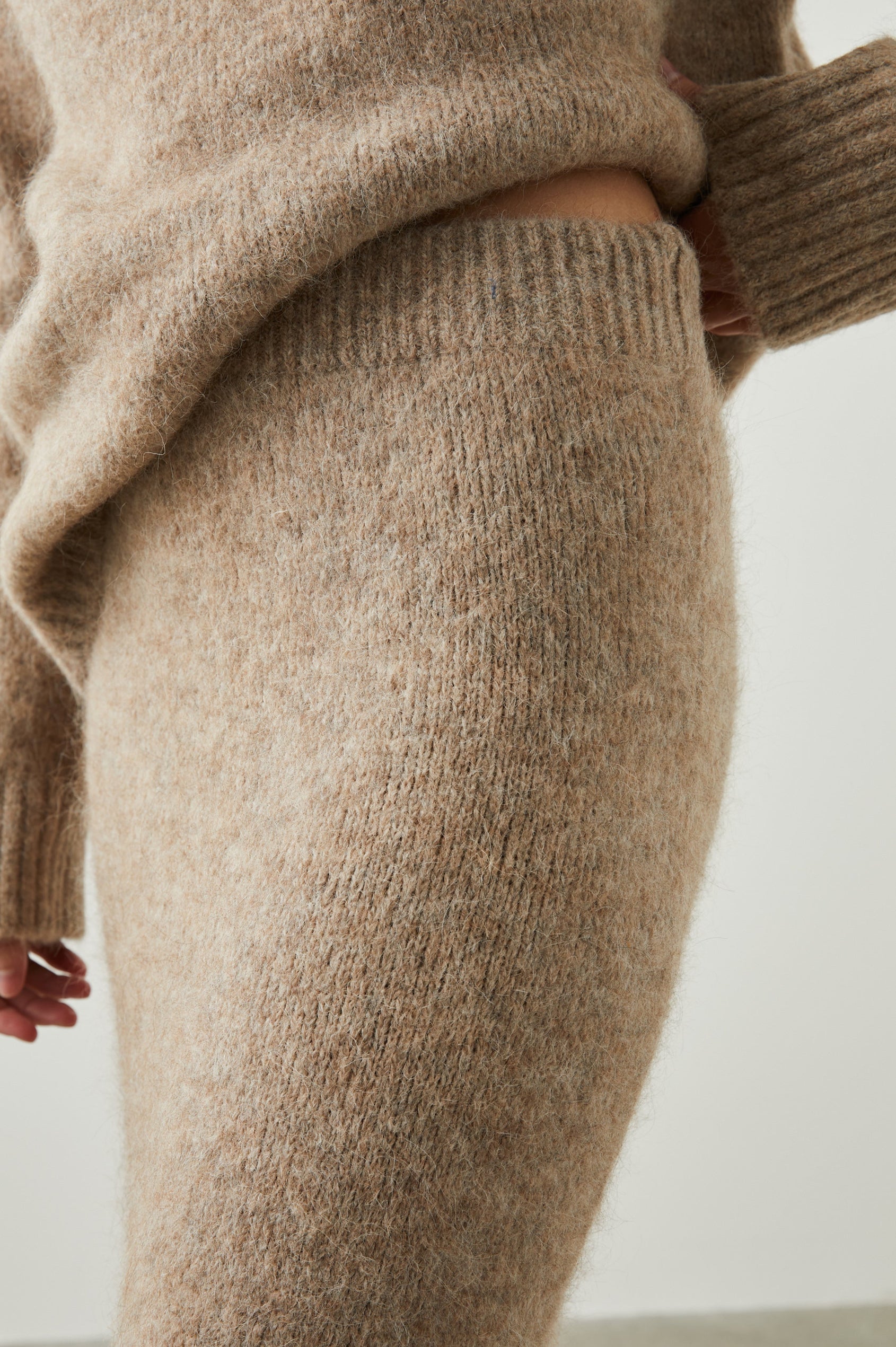 Diana Midi Skirt with a Side Slit and a Ribbed Waist in Oatmeal Colorway - Front View Featured on Model 