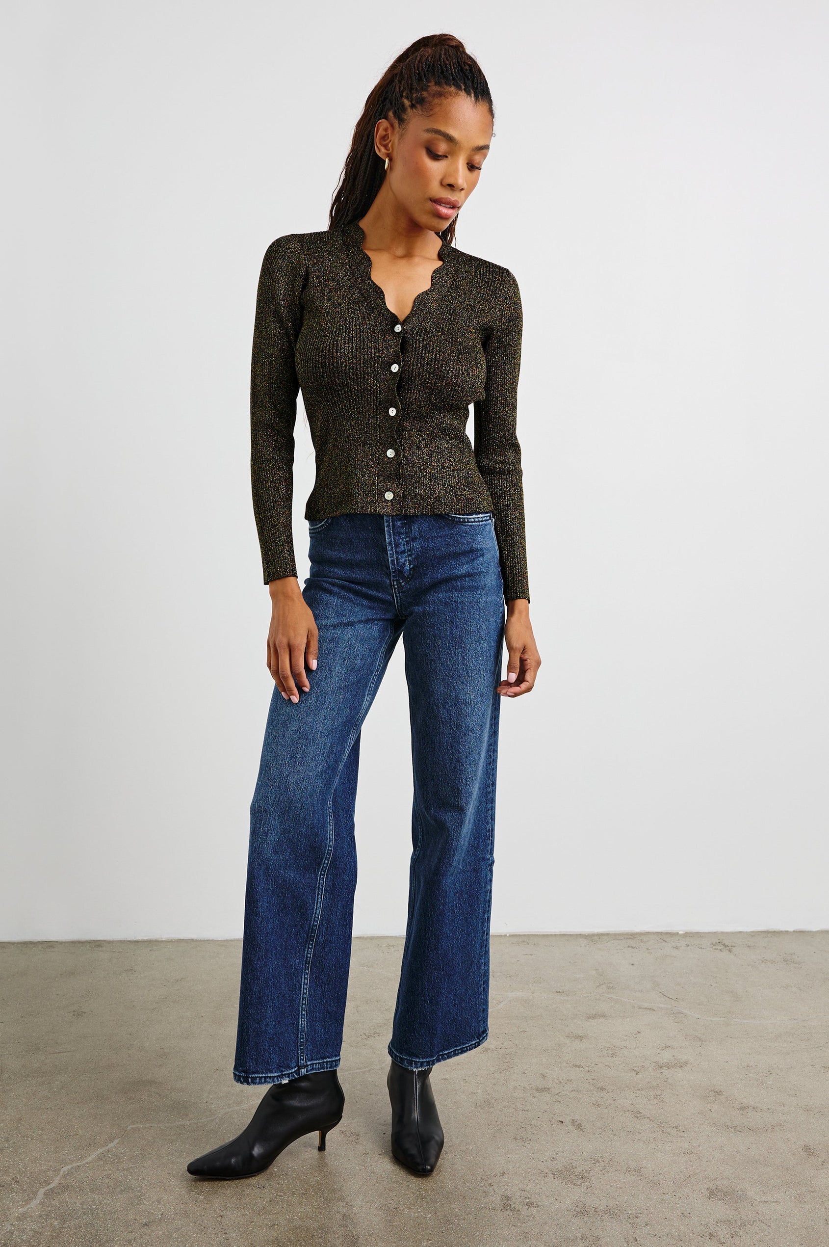 Dita Long-Sleeve Cardigan with Button Closure, a V neck and Scalloped Trim along the Neckline and Closure in Gold Lurex Colorway - Front Full Body View Featured on Model