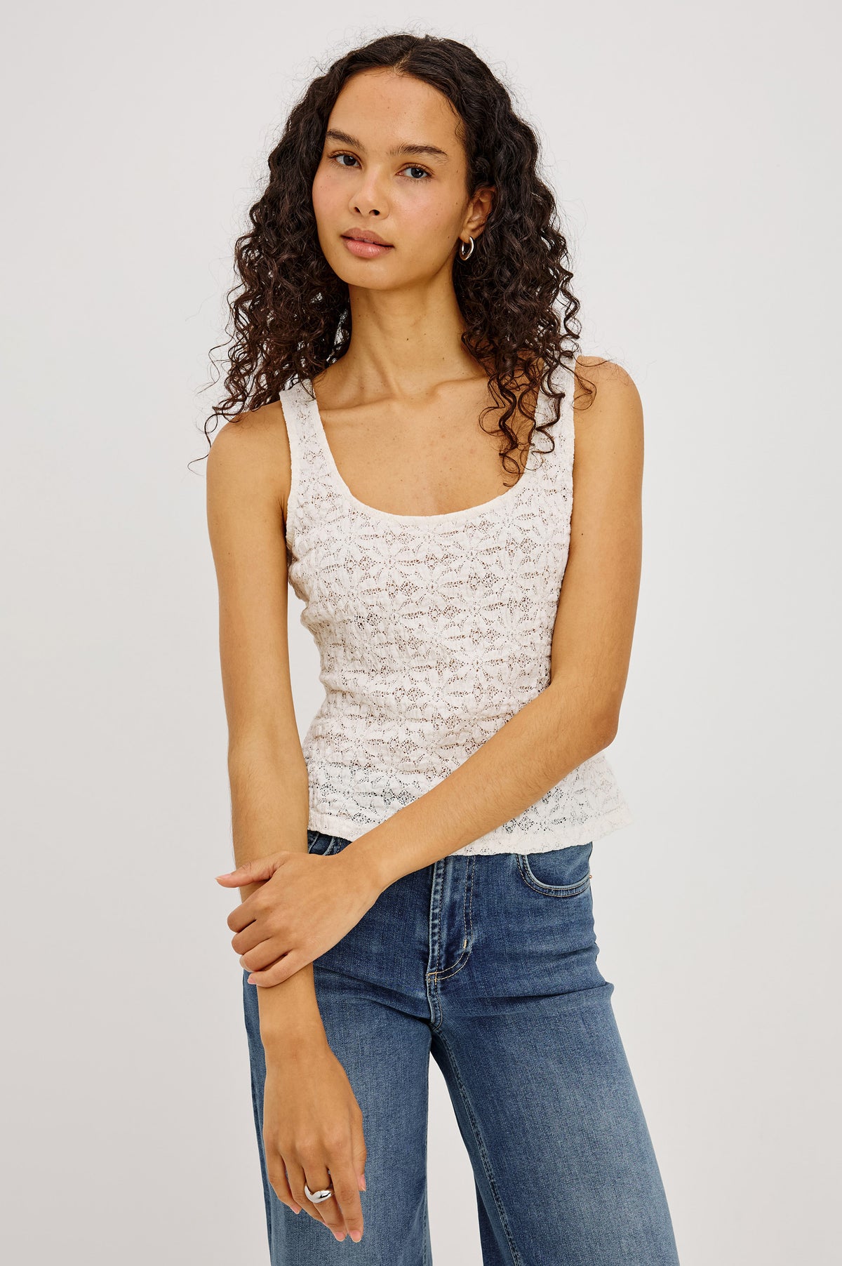 Donya Top in Sheer Stretch Mesh With Scoop Neckline, Tank-Style Shoulder Straps, and Sleeveless Cut in Ivory Colorway - Upper Body Front View Featured on Model