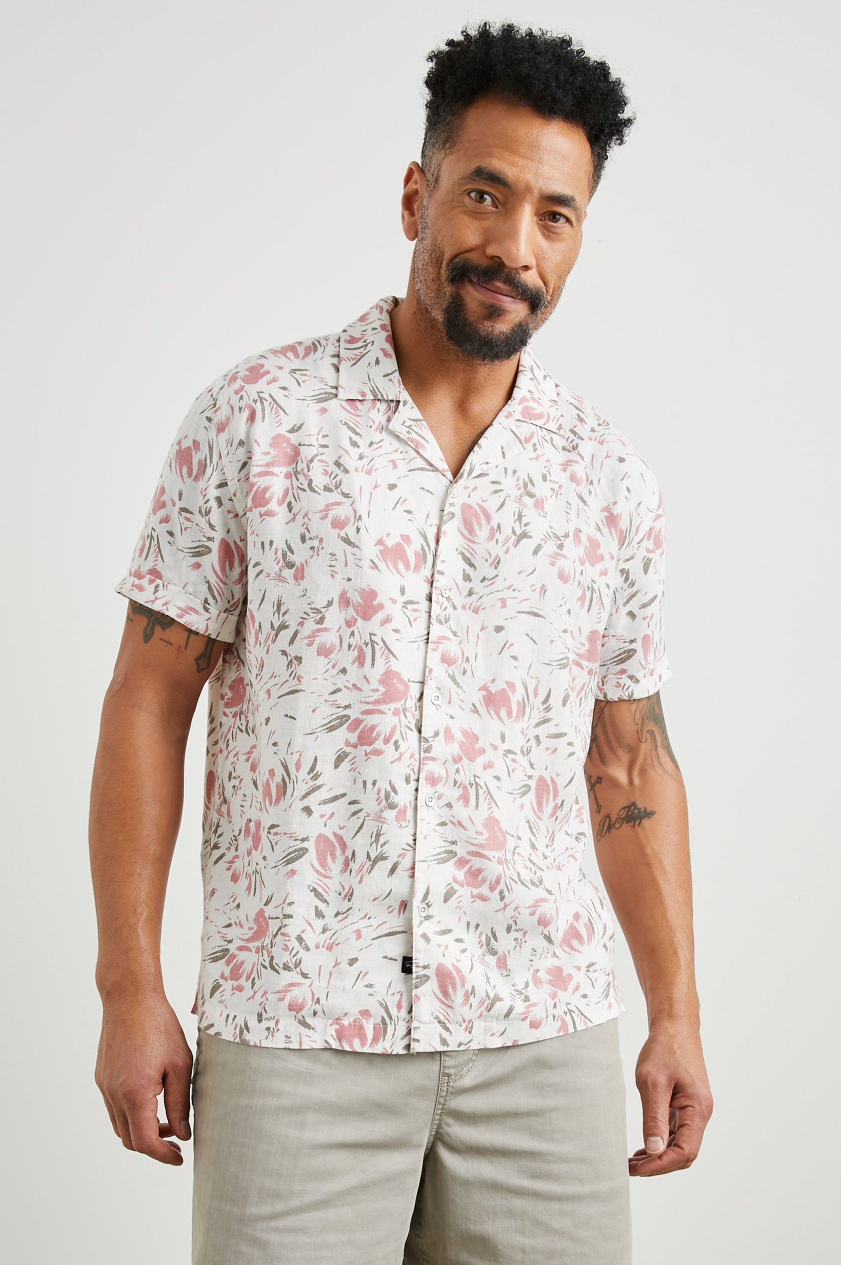 Dresden Short Sleeve Button Up with Rolled Cuffs in Brush Floral White Colorway, Pink and Brown Flowers on White - Front View Featured on Model