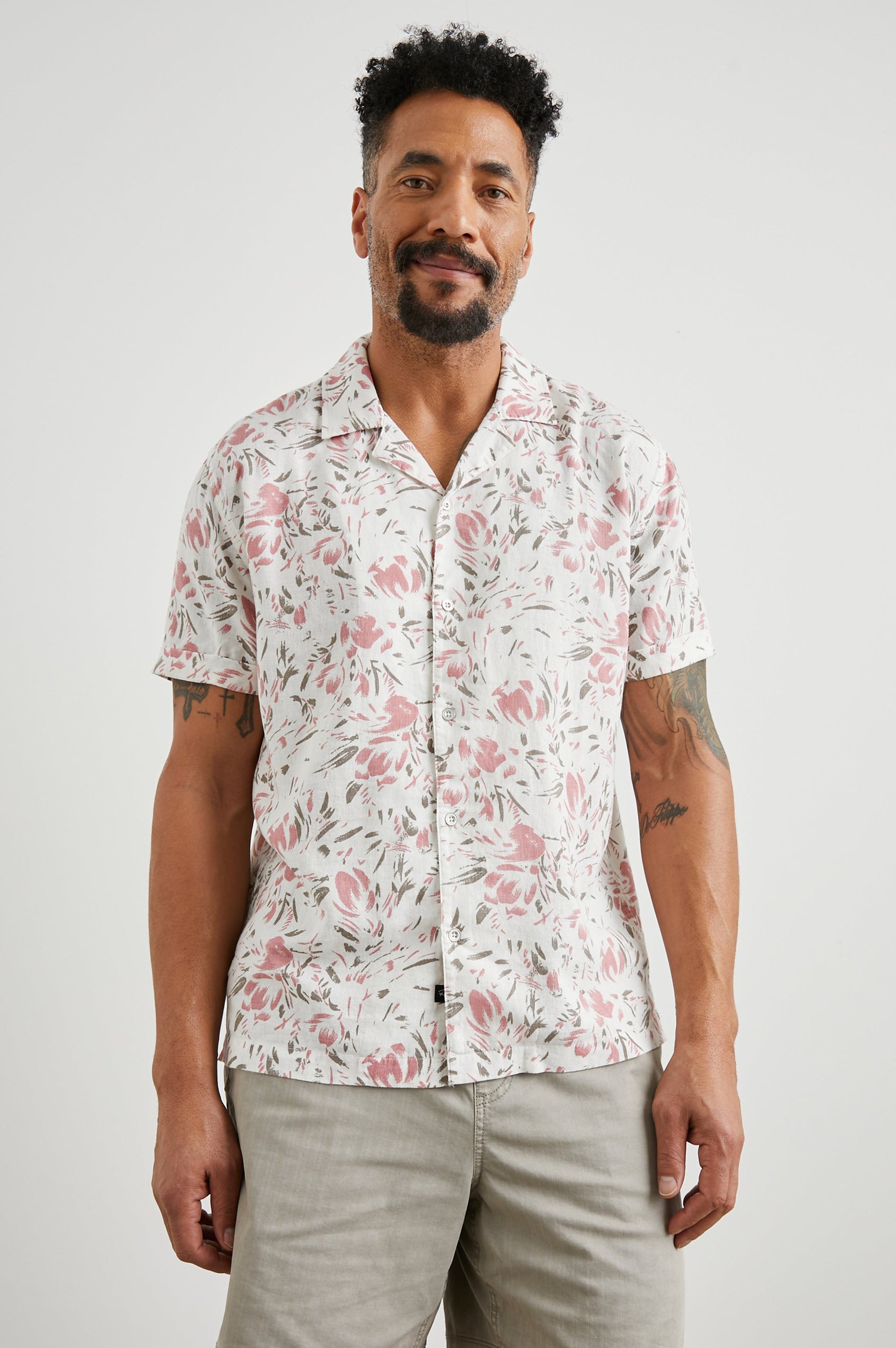 Dresden Short Sleeve Button Up with Rolled Cuffs in Brush Floral White Colorway, Pink and Brown Flowers on White - Front View Featured on Model