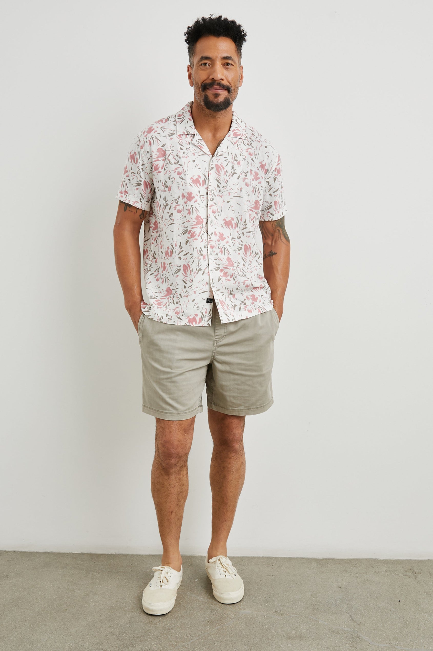 Dresden Short Sleeve Button Up with Rolled Cuffs in Brush Floral White Colorway, Pink and Brown Flowers on White - Front Full Body View Featured on Model
