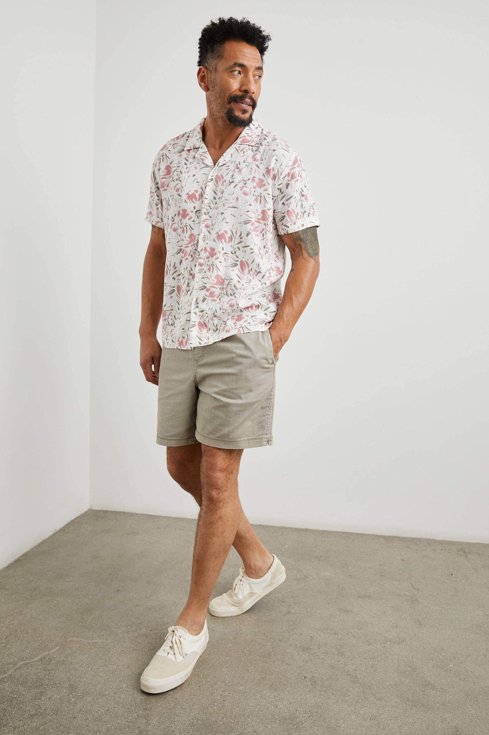 Dresden Short Sleeve Button Up with Rolled Cuffs in Brush Floral White Colorway, Pink and Brown Flowers on White - Front Full Body View Featured on Model
