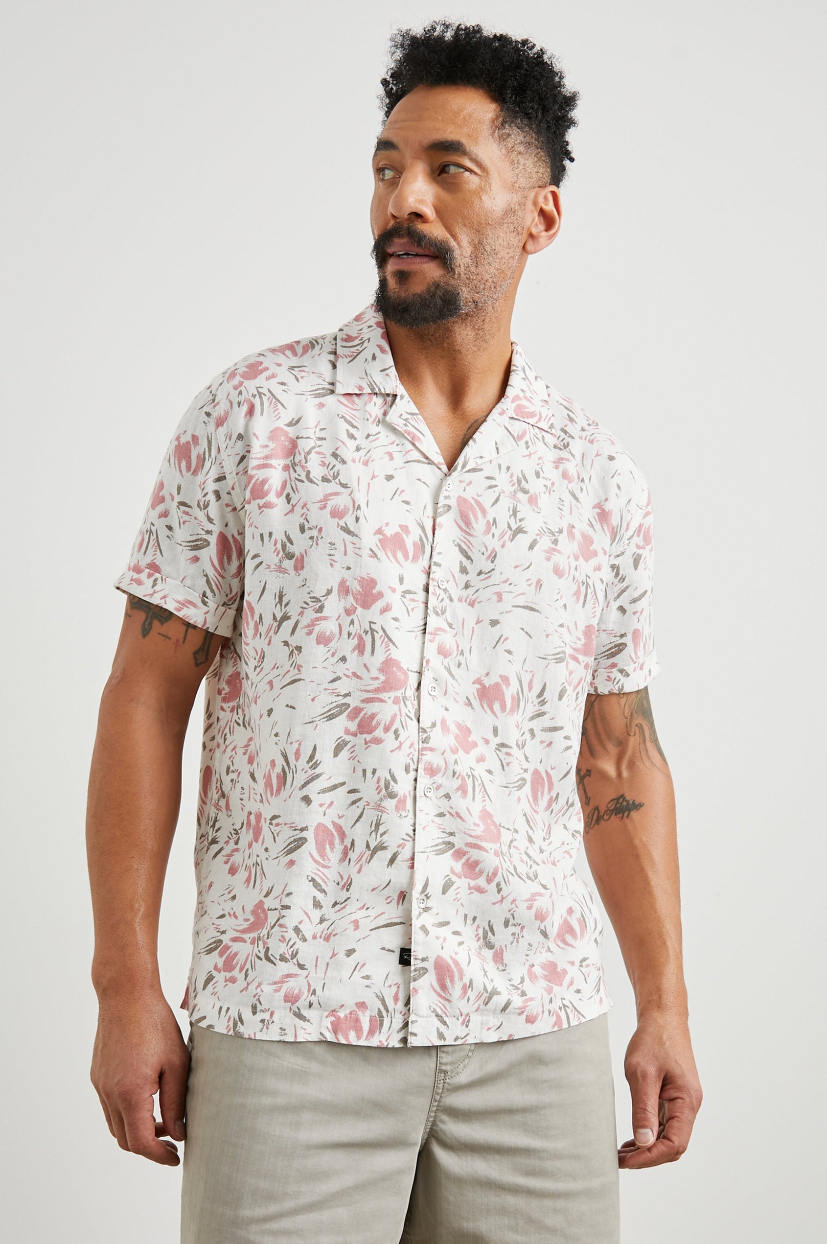 Dresden Short Sleeve Button Up with Rolled Cuffs in Brush Floral White Colorway, Pink and Brown Flowers on White - Front View Featured on Model