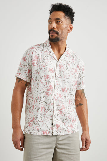 Dresden Short Sleeve Button Up with Rolled Cuffs in Brush Floral White Colorway, Pink and Brown Flowers on White - Front View Featured on Model
