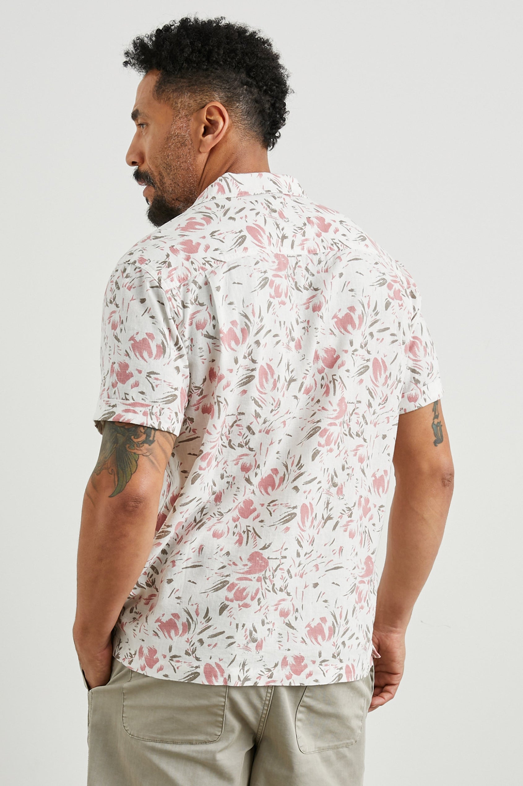 Dresden Short Sleeve Button Up with Rolled Cuffs in Brush Floral White Colorway, Pink and Brown Flowers on White - Back View Featured on Model