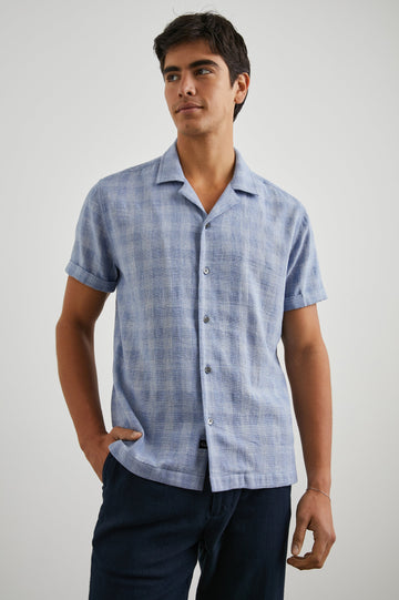Dresden Short Sleeve Button Up with Rolled Cuffs in Home Spun Blue Gingham Colorway - Front View Featured on Model