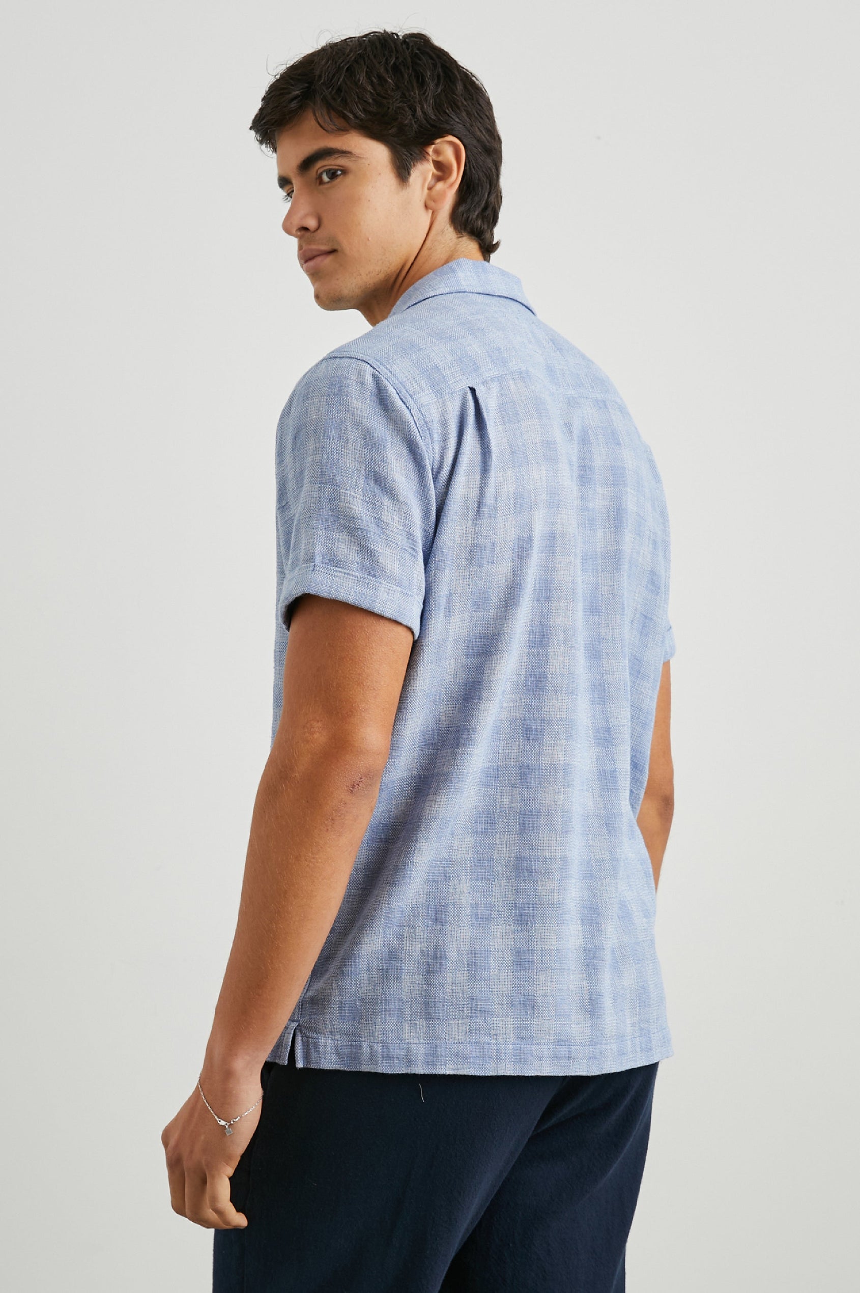 Dresden Short Sleeve Button Up with Rolled Cuffs in Home Spun Blue Gingham Colorway - Back View Featured on Model