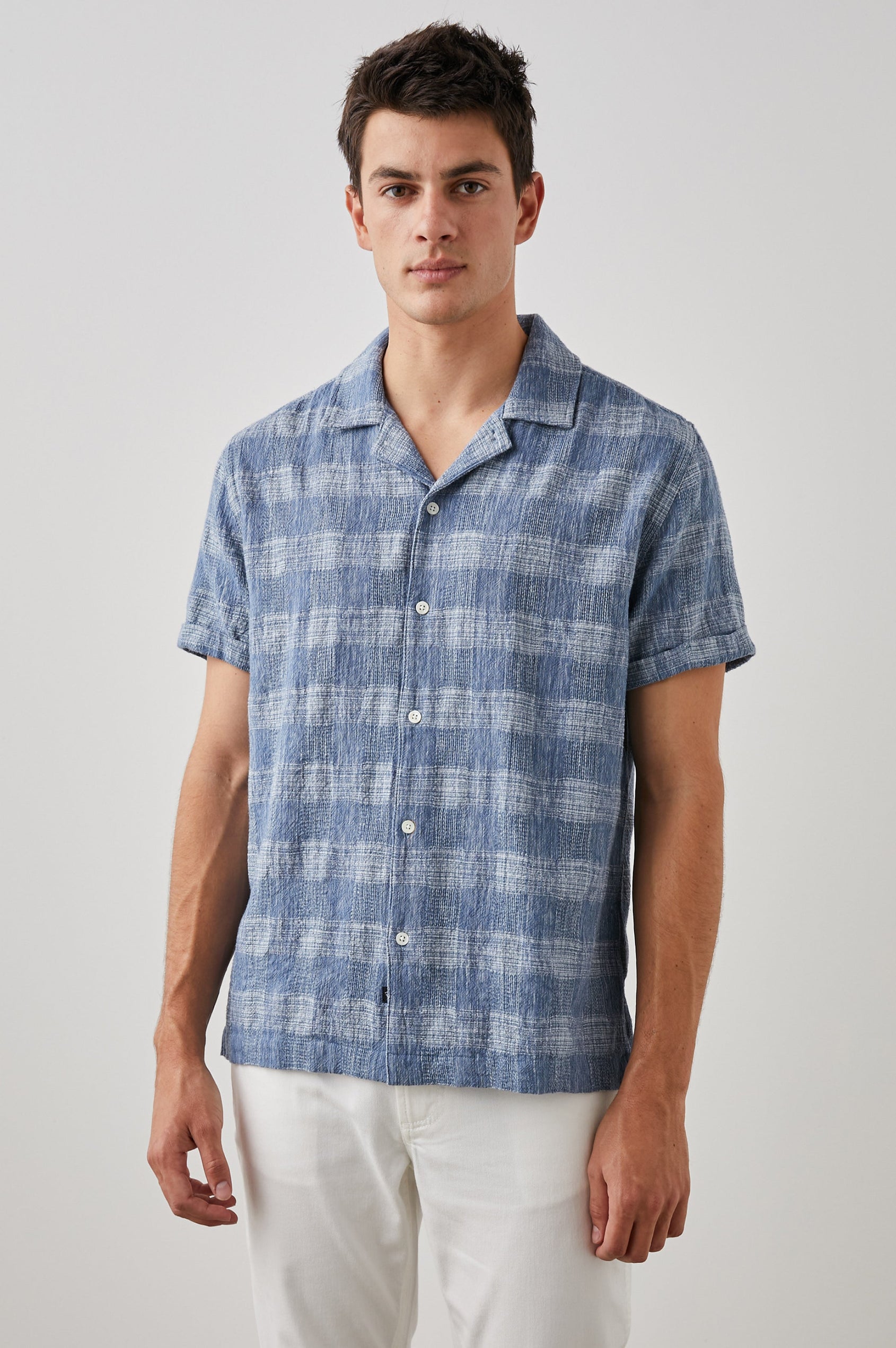 Dresden Short Sleeve Button Up with Rolled Cuffs in Kyoto Blue Colorway, a Blue and White Plaid - Front View Featured on Model
