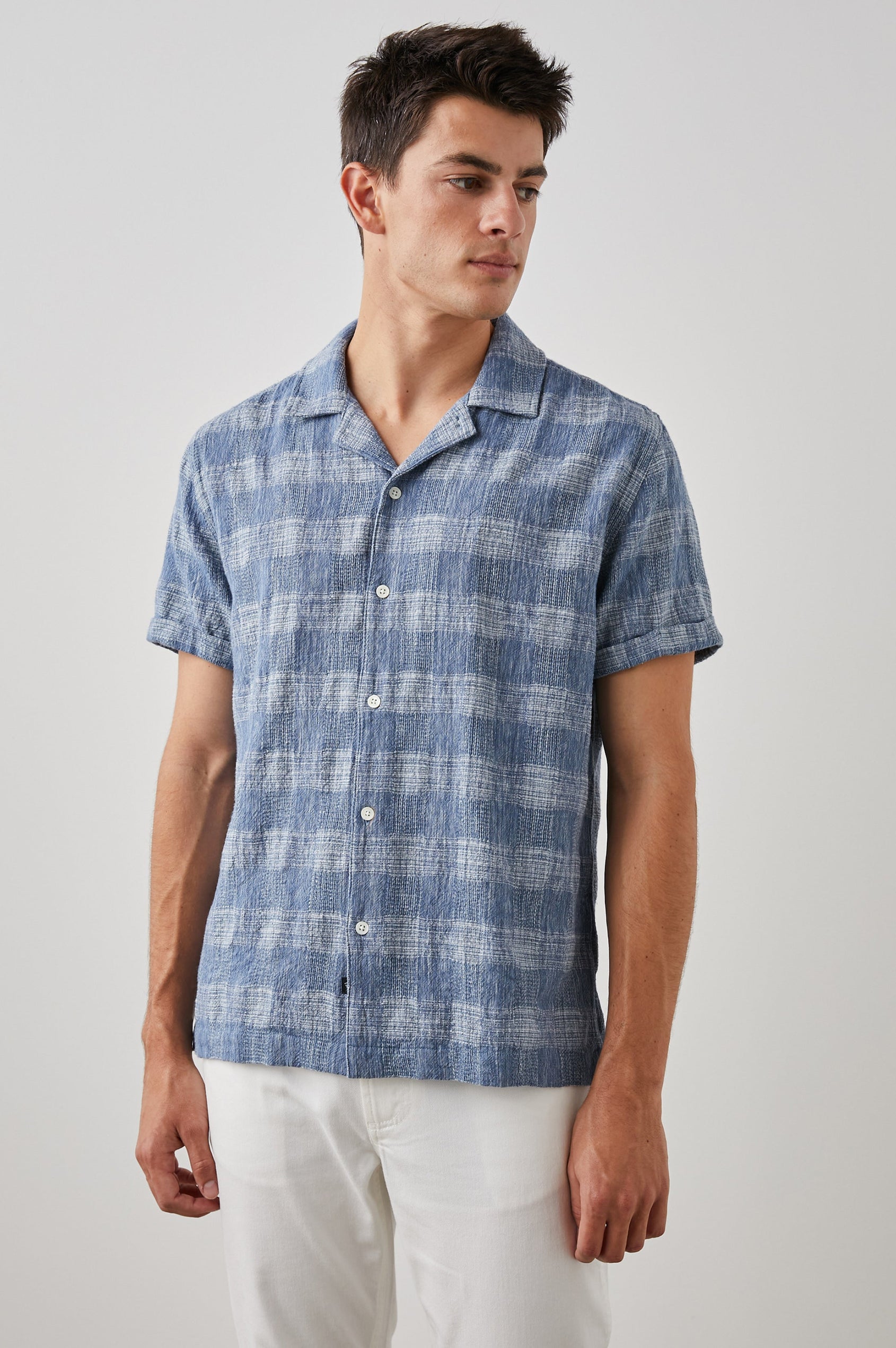 Dresden Short Sleeve Button Up with Rolled Cuffs in Kyoto Blue Colorway, a Blue and White Plaid - Front View Featured on Model