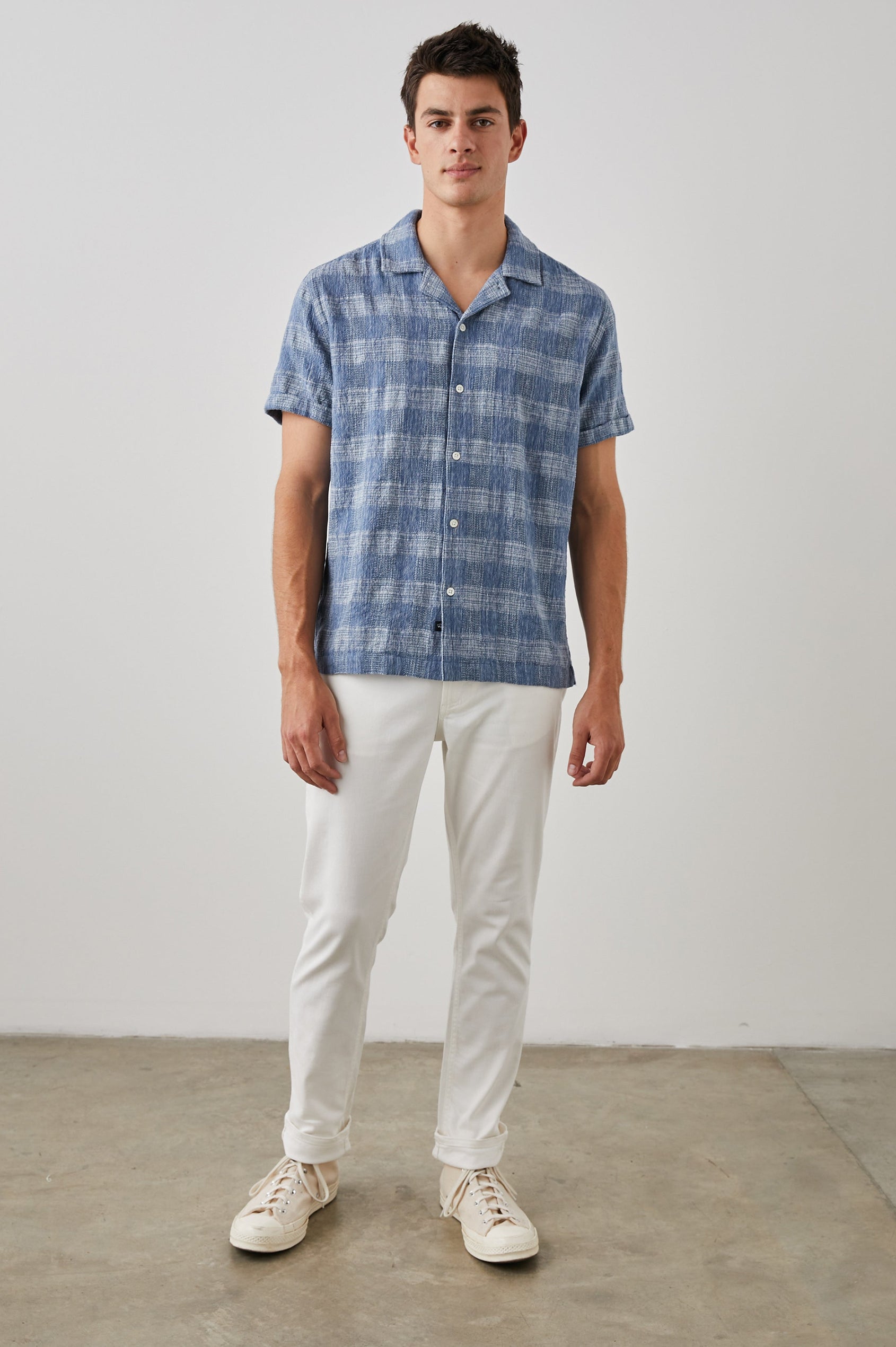 Dresden Short Sleeve Button Up with Rolled Cuffs in Kyoto Blue Colorway, a Blue and White Plaid - Front Full Body View Featured on Model