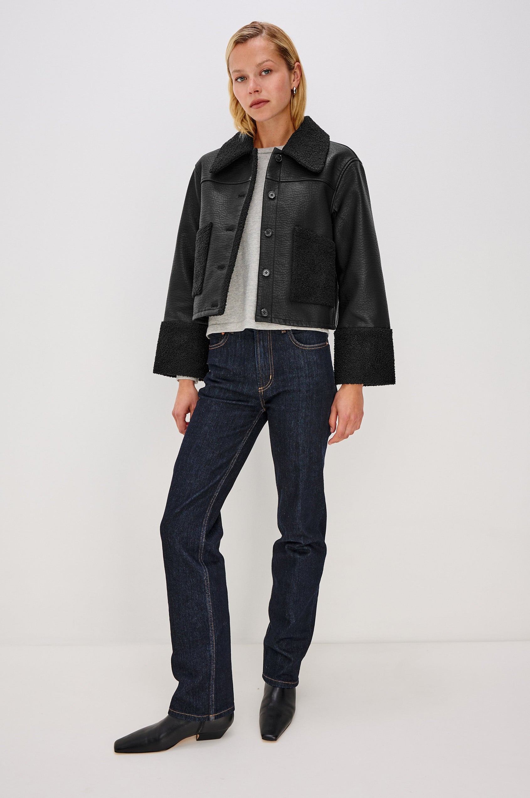 Dria Jacket with Button Closure, Two Front Patch Pockets and Faux Shearling at the Pockets, Cuffs, Collar and Opening in Black Shearling Colorway, Full Body Front View Featured on Model 