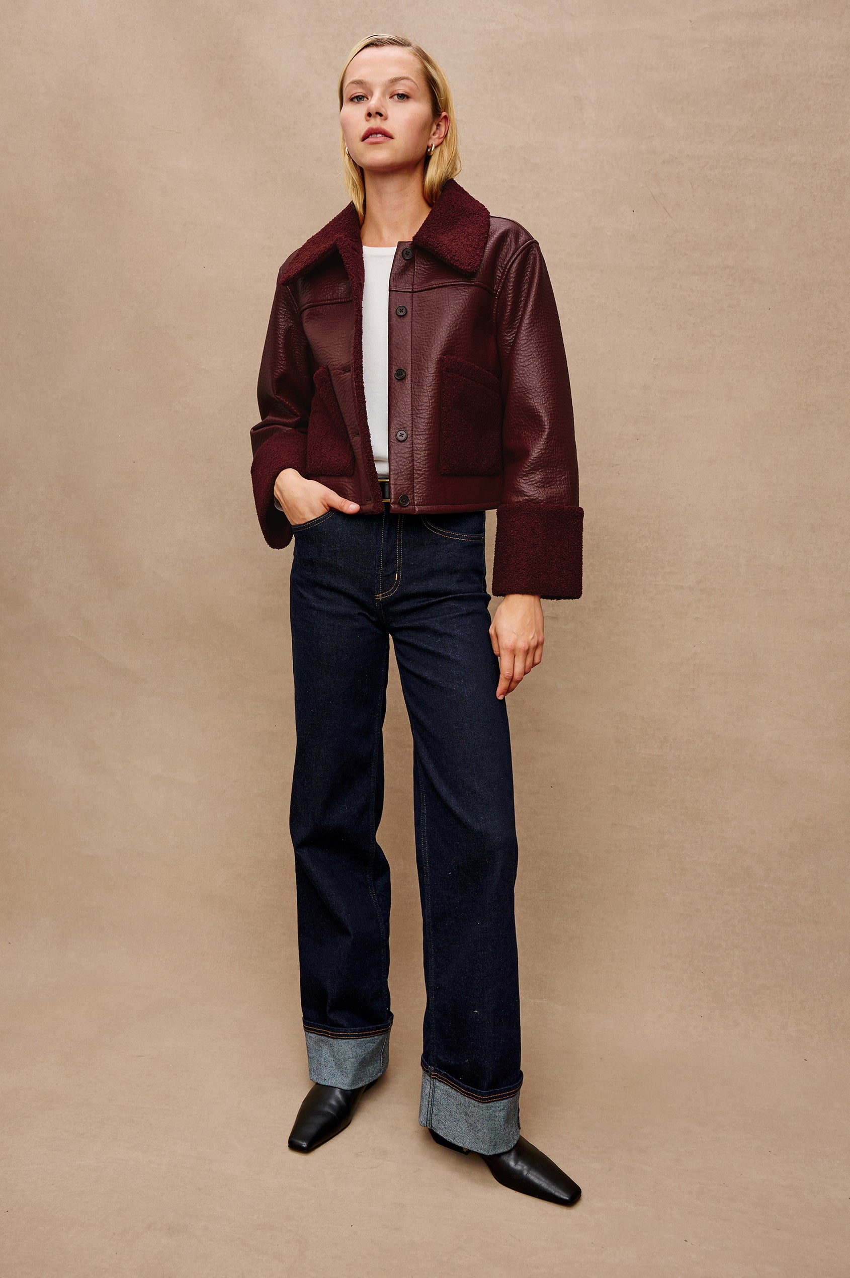 Dria Jacket with Button Closure, Two Front Patch Pockets and Faux Shearling at the Pockets, Cuffs, Collar and Opening in Maroon Shearling Colorway, Full Body Front View Featured on Model 