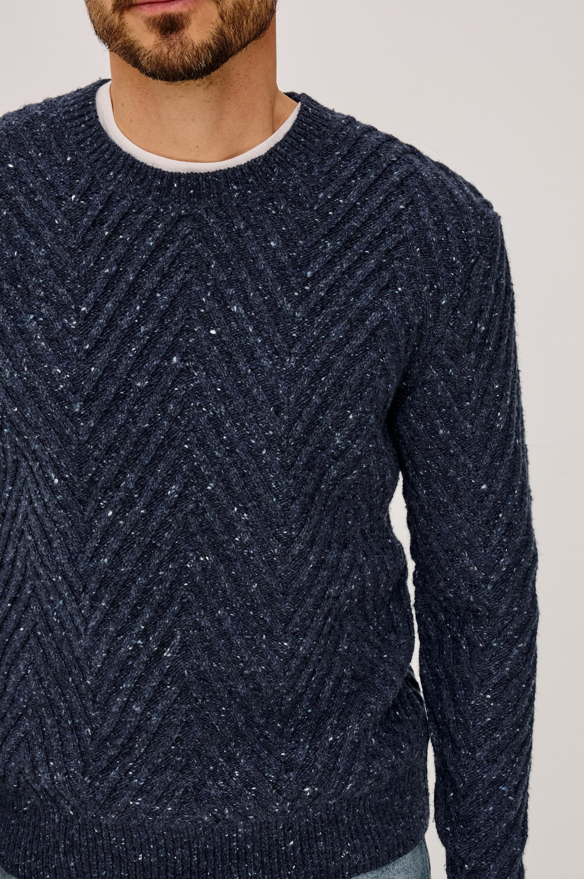 Dumont Sweater in Alpaca-Wool Blend With Crewneck, Oversized Chevron Stitch, Classic Fit, and Long Sleeves in Maritime Nep Colorway - Upper Body Front Detail View Featured on Model.