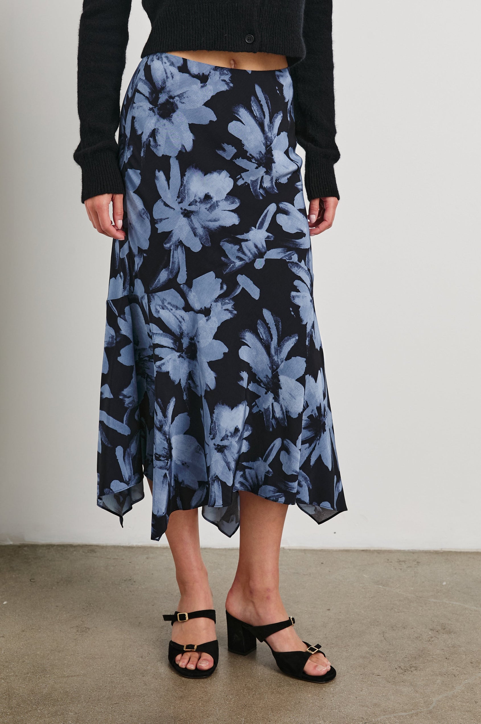 Edwina Midi Skirt with a Handkerchief Hem in Midnight Lily Colorway, Blue Lillies on Midnight - Front View Featured on Model
