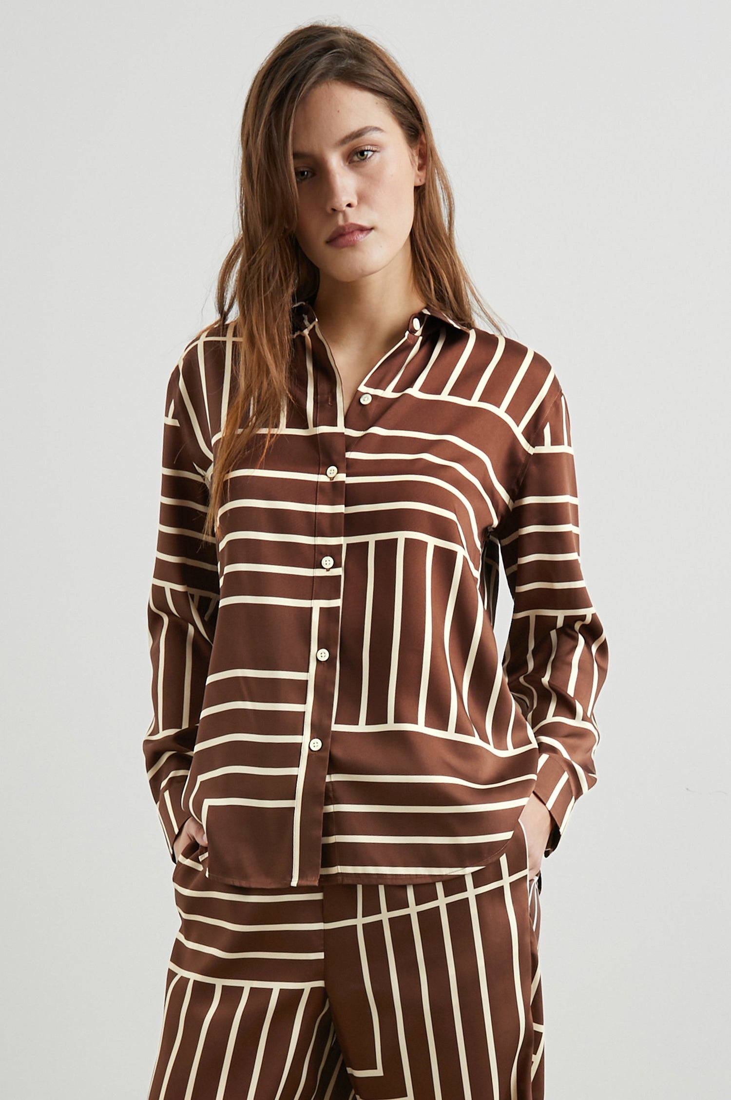 Elias Long Sleeve Button Up in Brown Line Art Colorway, Vertical and Horizontal White Lines on Brown - Front View Featured on Model