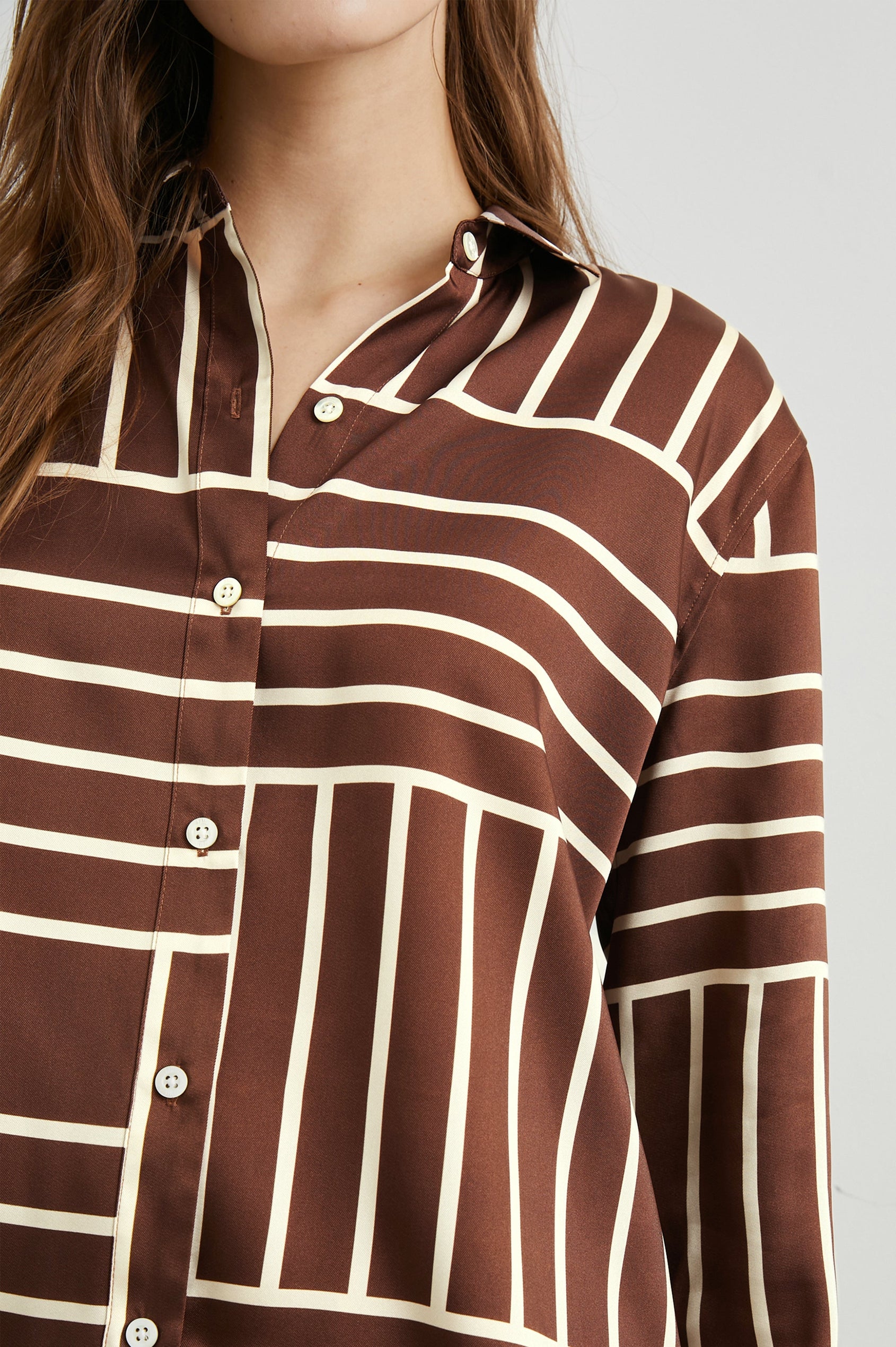 Elias Long Sleeve Button Up in Brown Line Art Colorway, Vertical and Horizontal White Lines on Brown - Front View Featured on Model