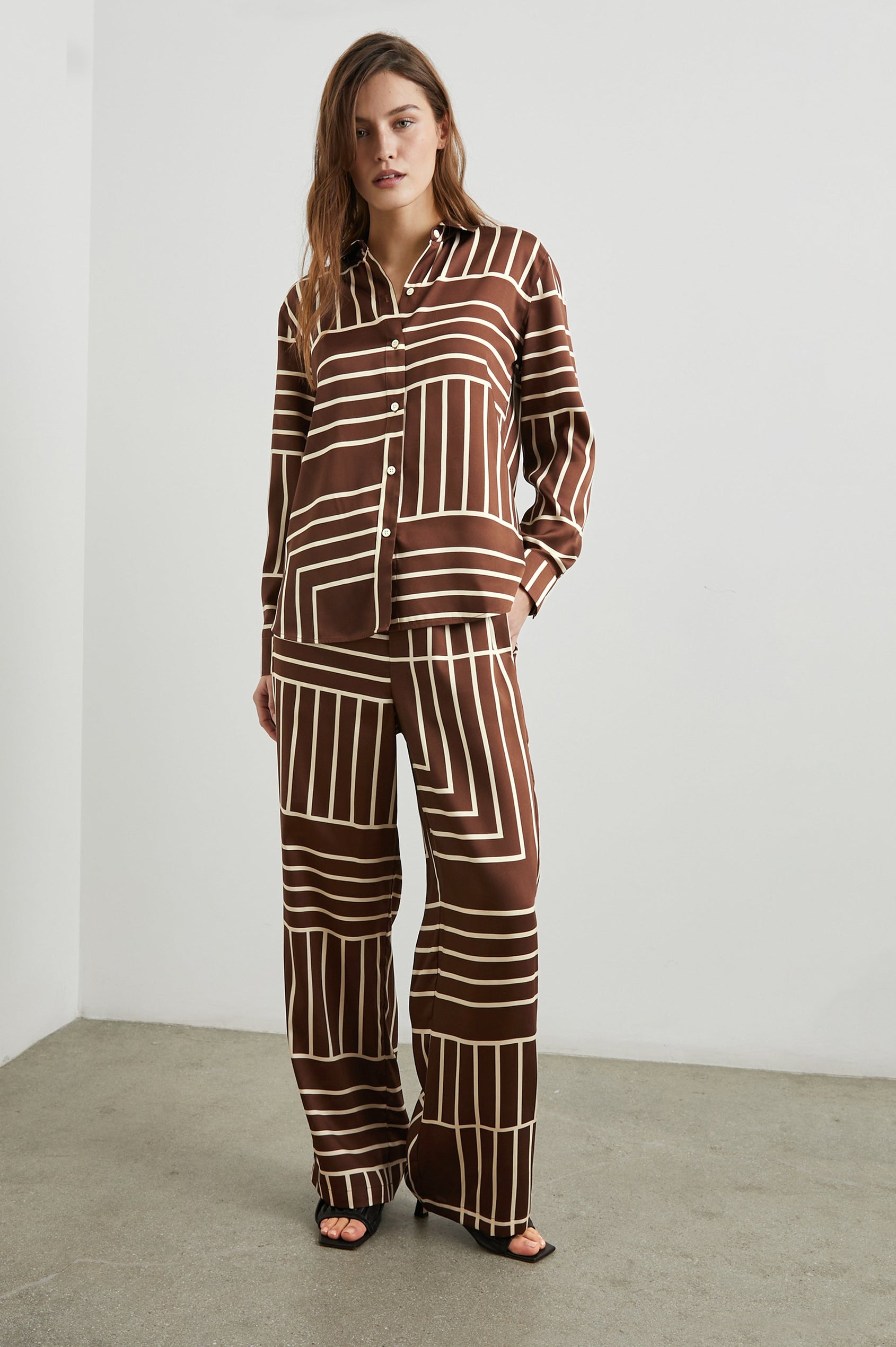 Elias Long Sleeve Button Up in Brown Line Art Colorway, Vertical and Horizontal White Lines on Brown - Front Full Body View Featured on Model