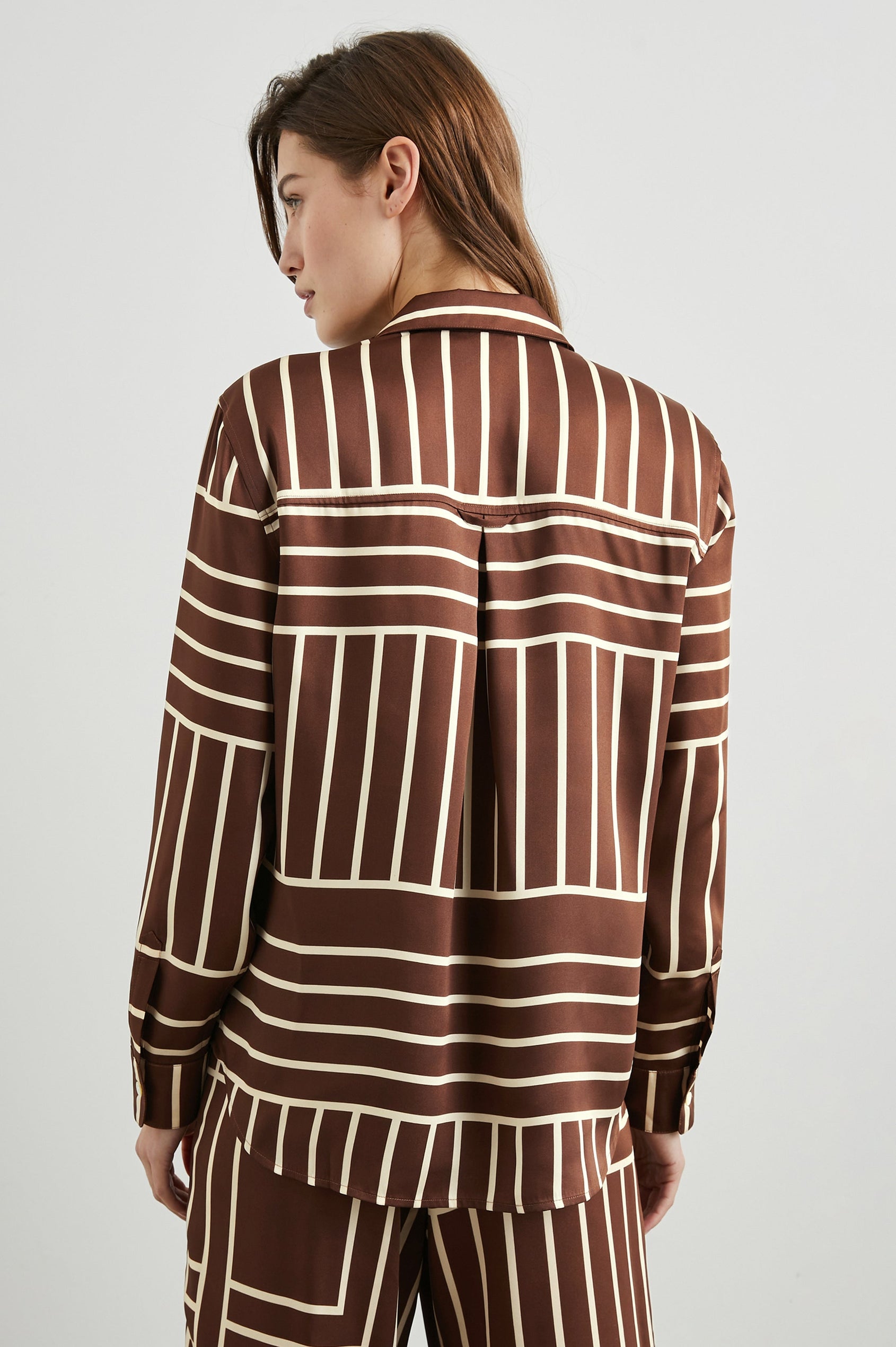 Elias Long Sleeve Button Up in Brown Line Art Colorway, Vertical and Horizontal White Lines on Brown - Back View Featured on Model