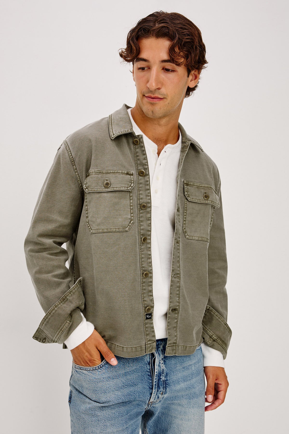 Eliot Jacket in Cotton Twill With Front Button Placket, Chest Flap Pockets, Point Collar, and Long Sleeves in Terra Colorway - Front View Featured on Model.