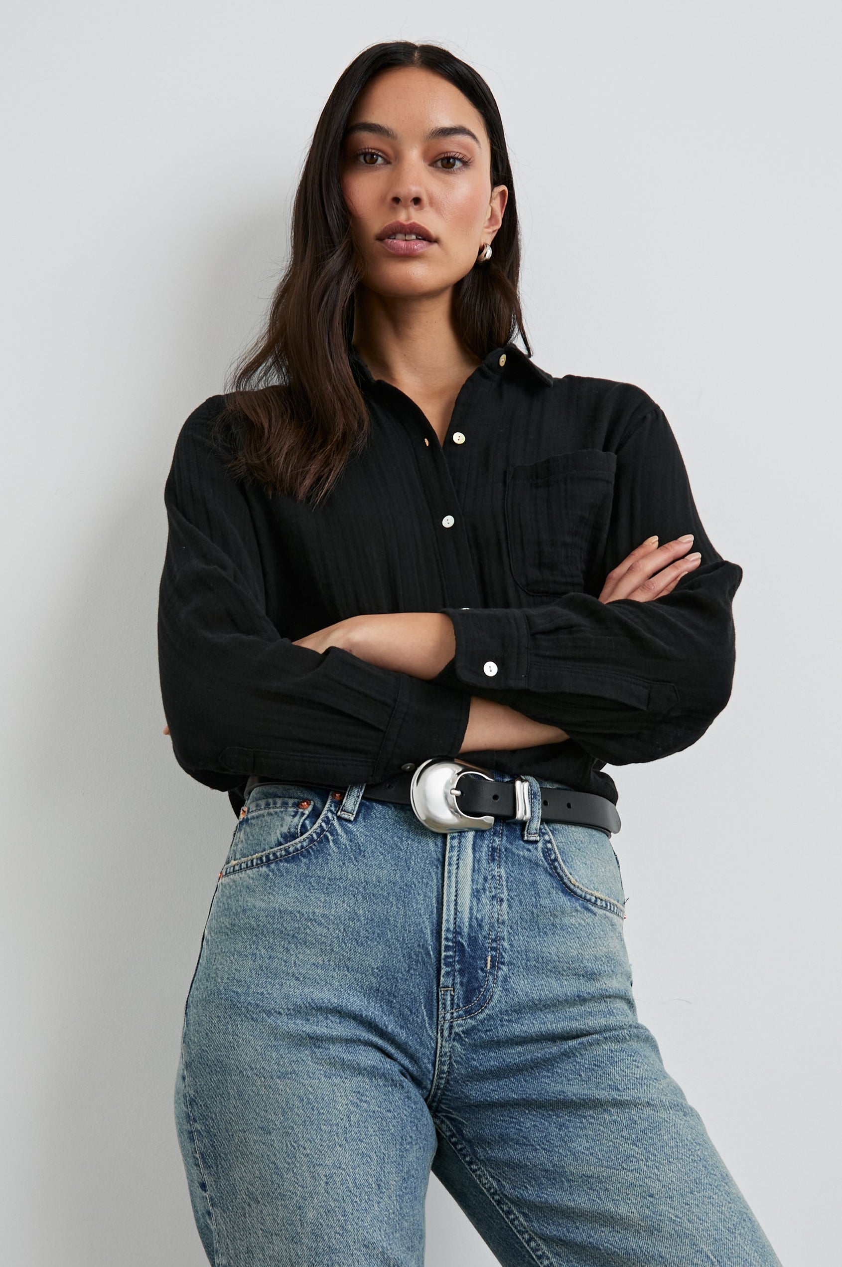 Ellis Long-Sleeve Button Down with Cuffs and a Front Chest Pocket in Black Colorway - Front tucked View Featured on Model