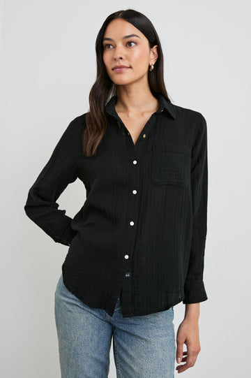 Ellis Long-Sleeve Button Down with Cuffs and a Front Chest Pocket in Black Colorway - Front Untucked View Featured on Model
